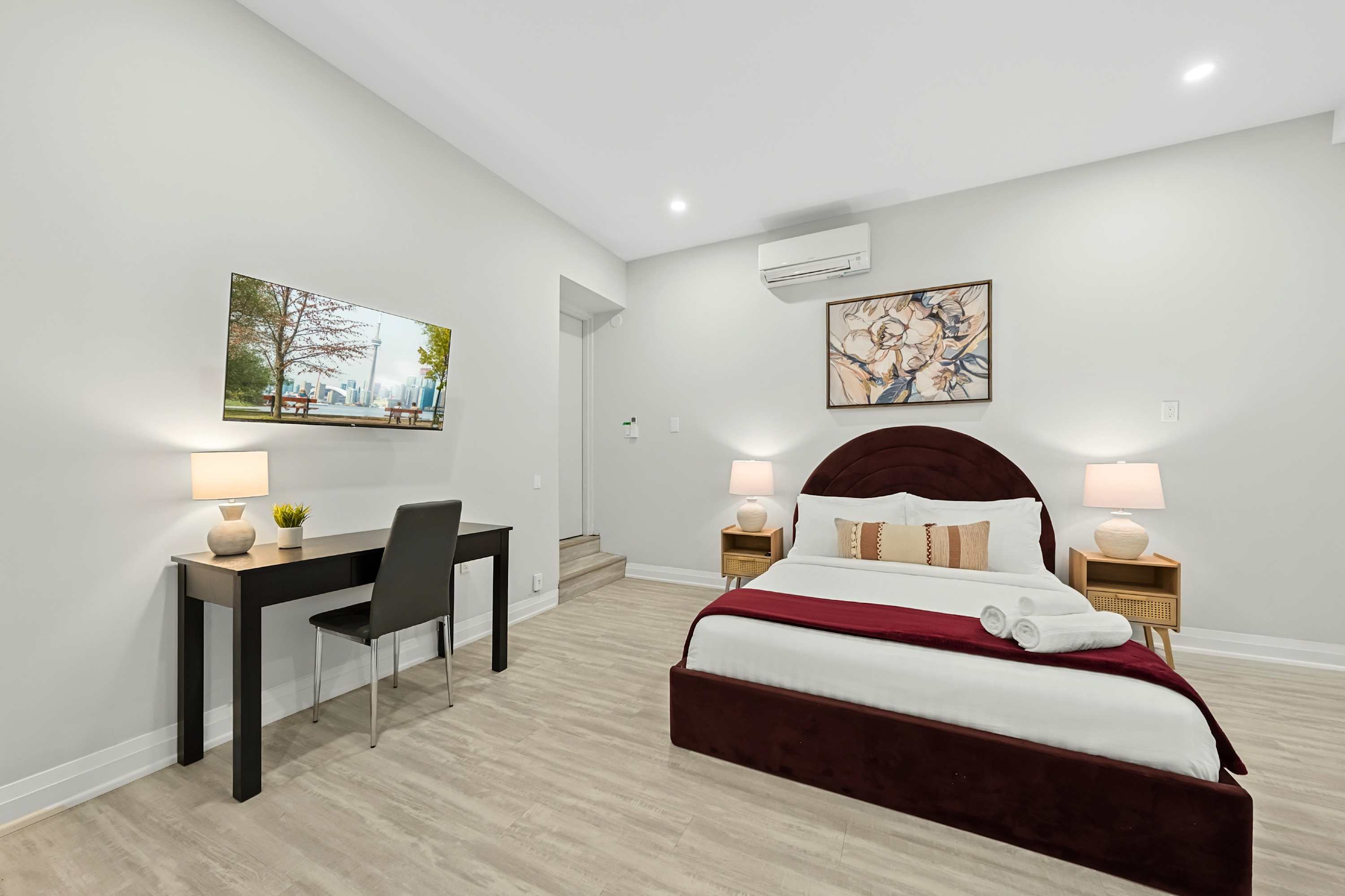 Queen bedroom with Smart TV for relaxed evenings and private downtime.