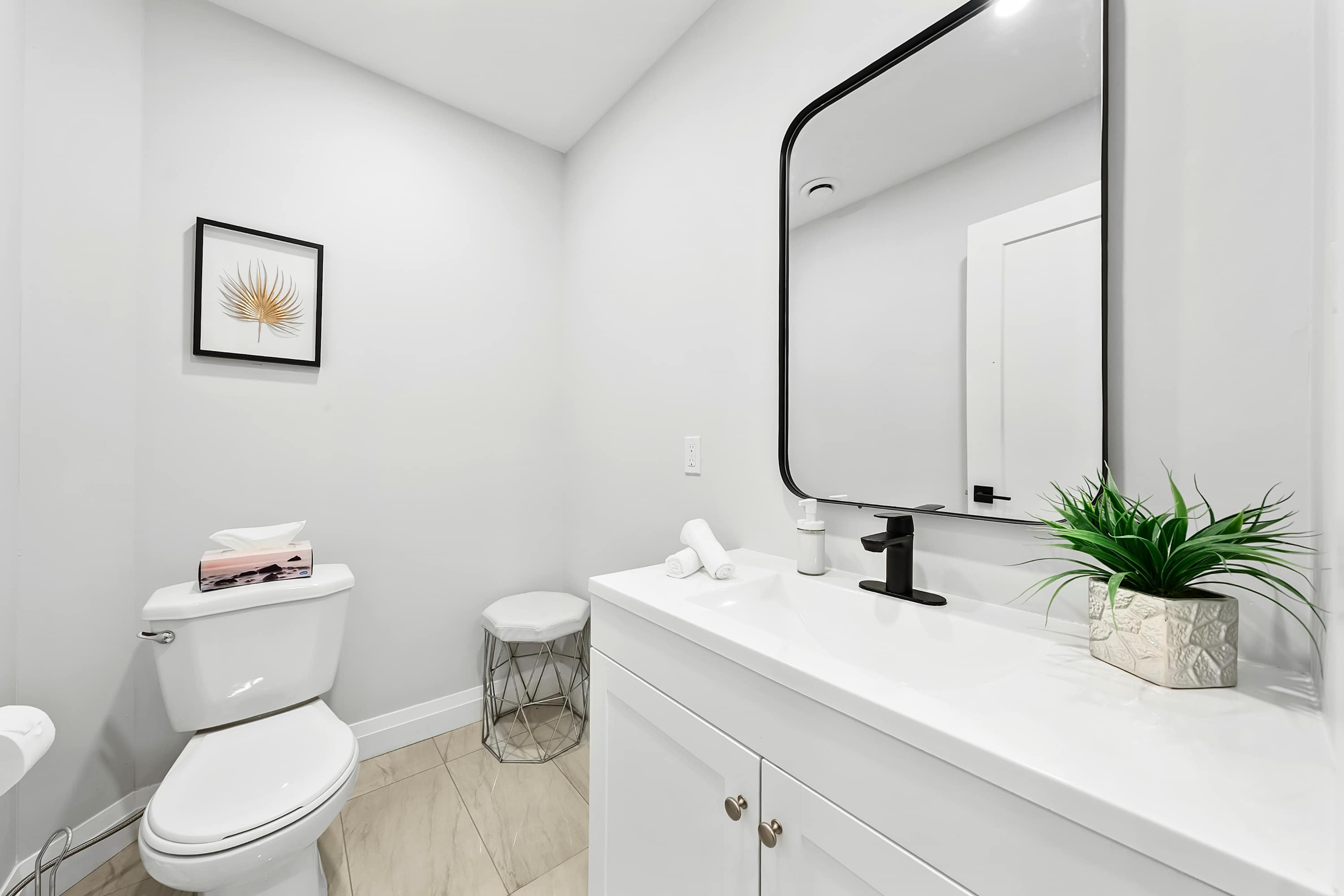 Powder room for guest use and everyday convenience.