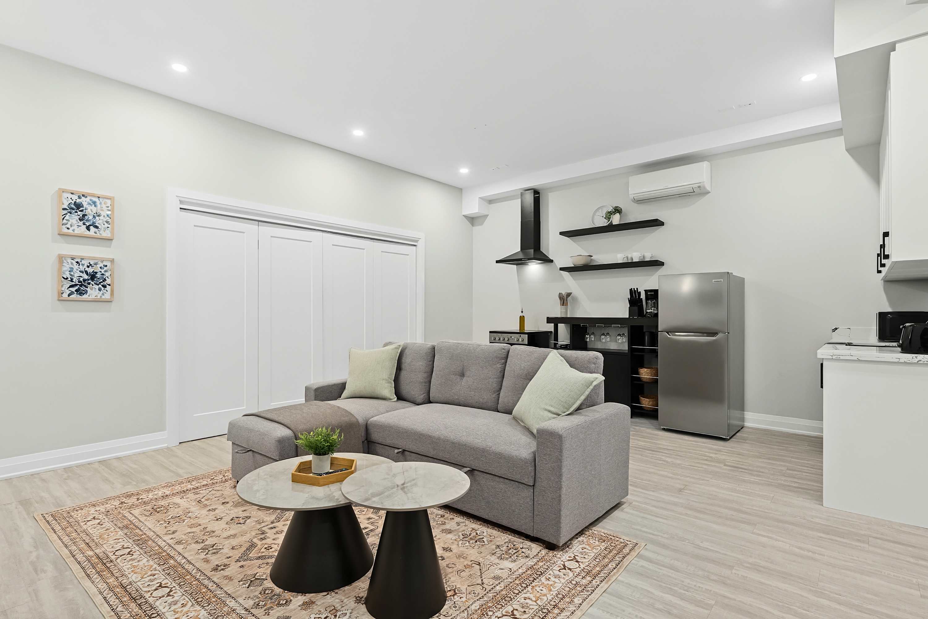 Enjoy the living area while staying connected with the kitchen, perfect for cooking and conversation together.