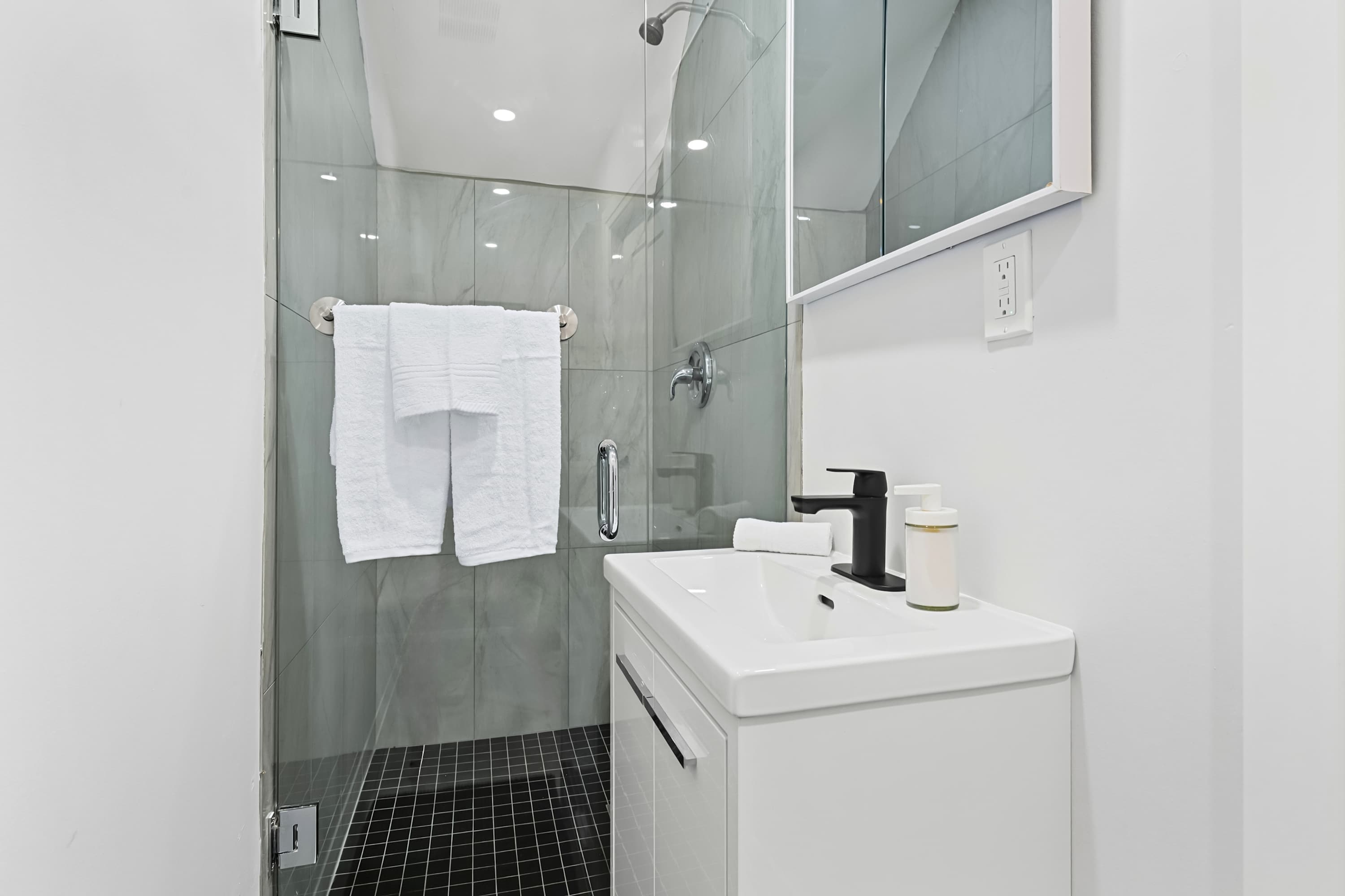 Bathroom with walk in shower for a refreshing start or end to your day.