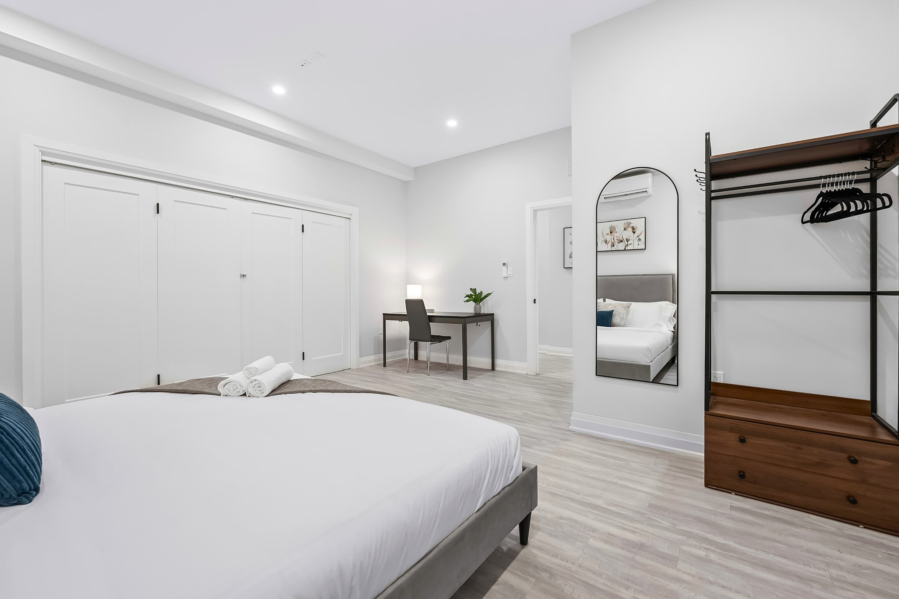 King bedroom with a dedicated setup for focus, work, or study during your stay.