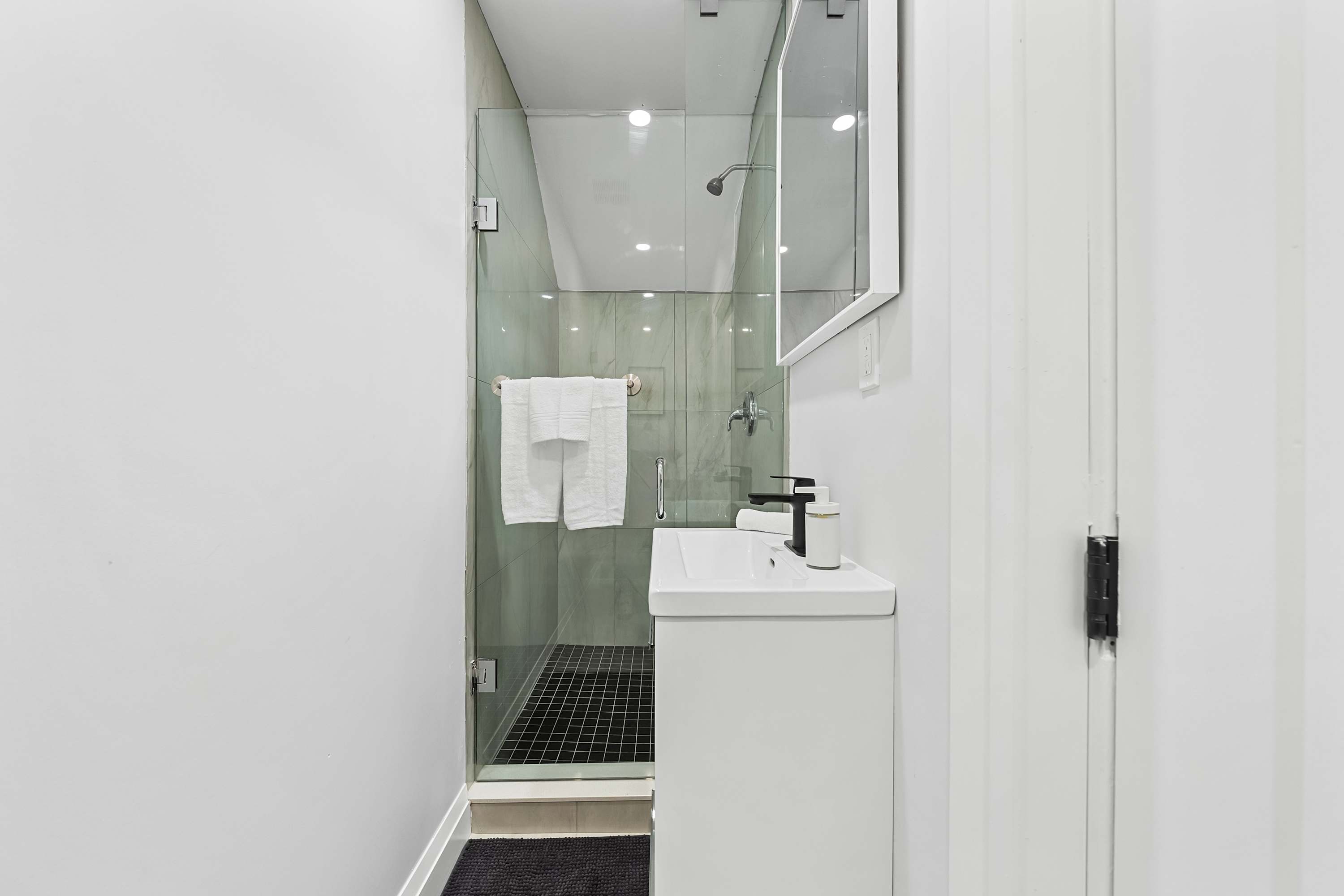 Bathroom with walk in shower for a refreshing start or end to your day.