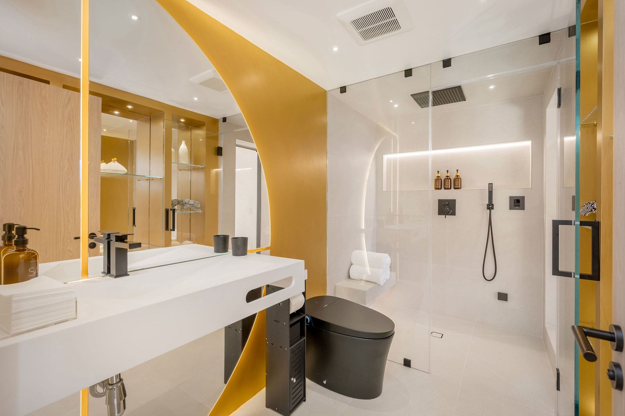 Move straight from vanity to walk-in shower, with everything set within one open layout.