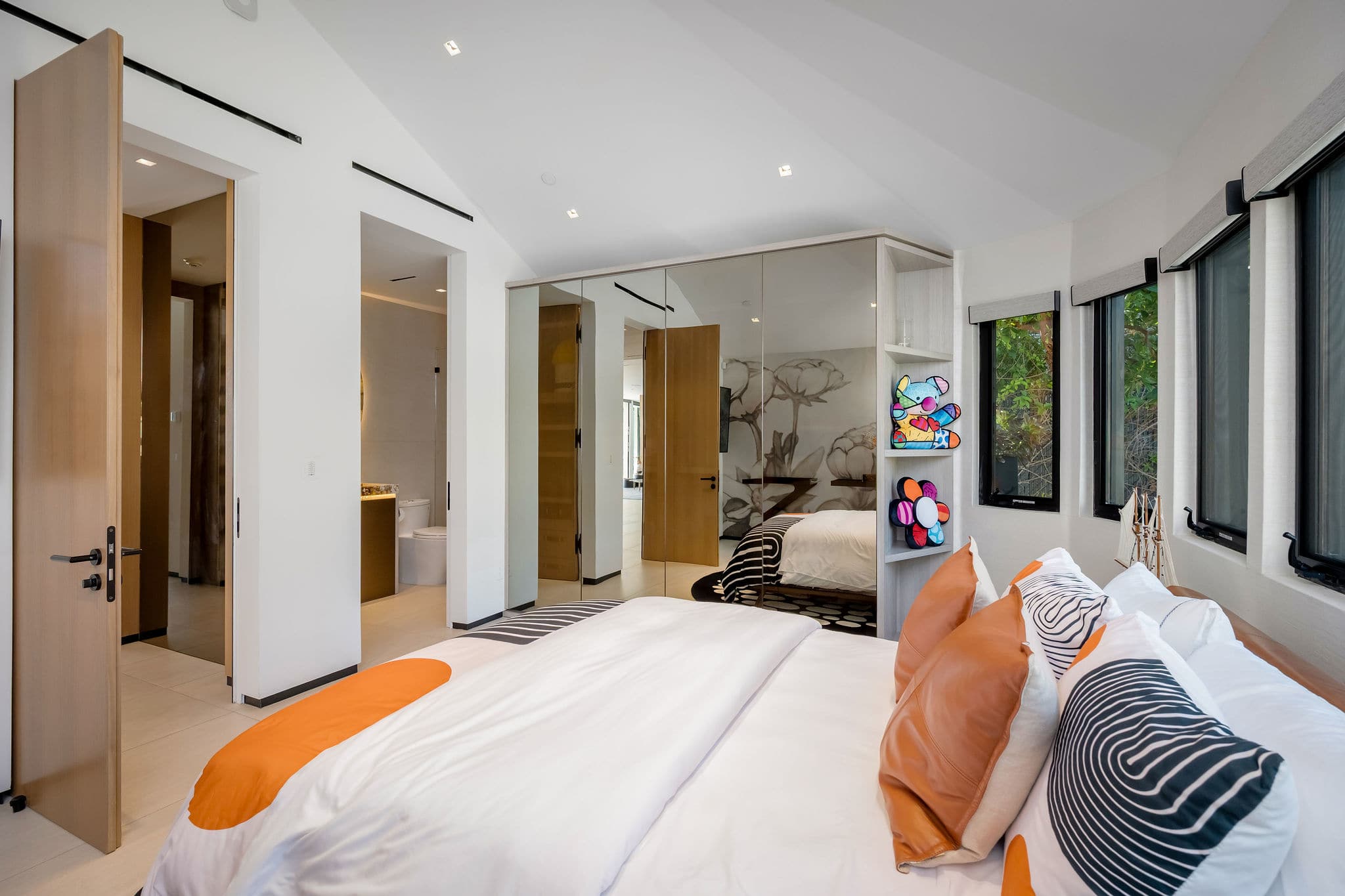 Designed for longer stays, with integrated storage and media kept close at hand.