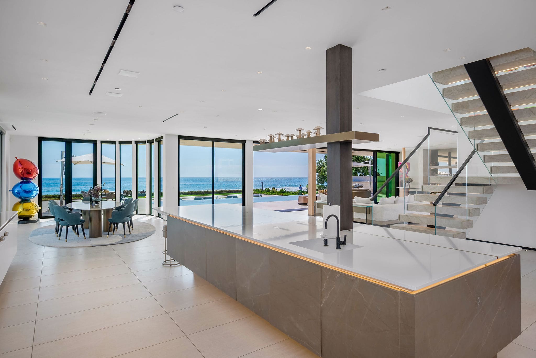 Cook, dine, and gather in one open kitchen and living space with the ocean always in view.