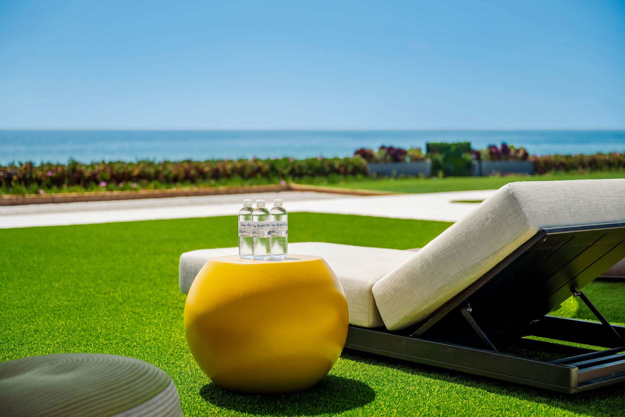 Stretch out on the lawn with the oceanfront just ahead of you.