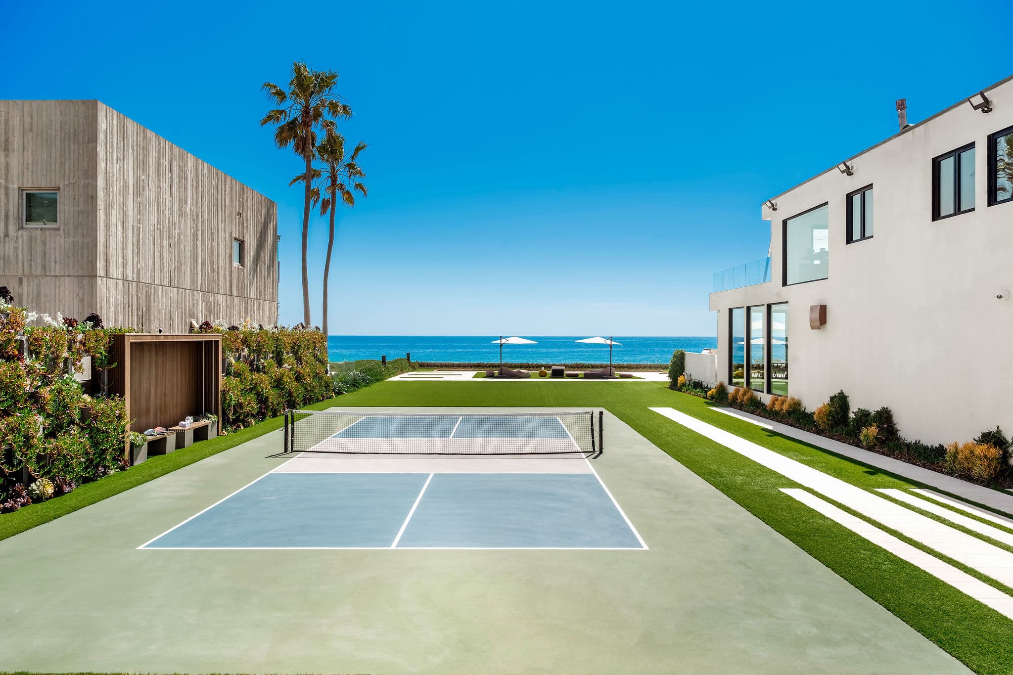 Play on your private sport court with the oceanfront just beyond the net.