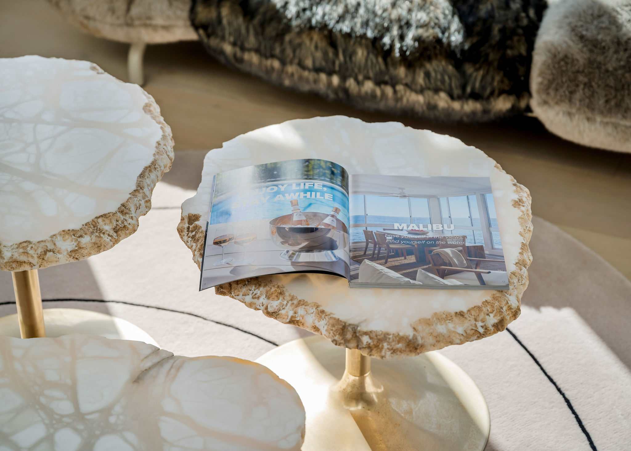 Pause in the lounge with curated details set within your living space.