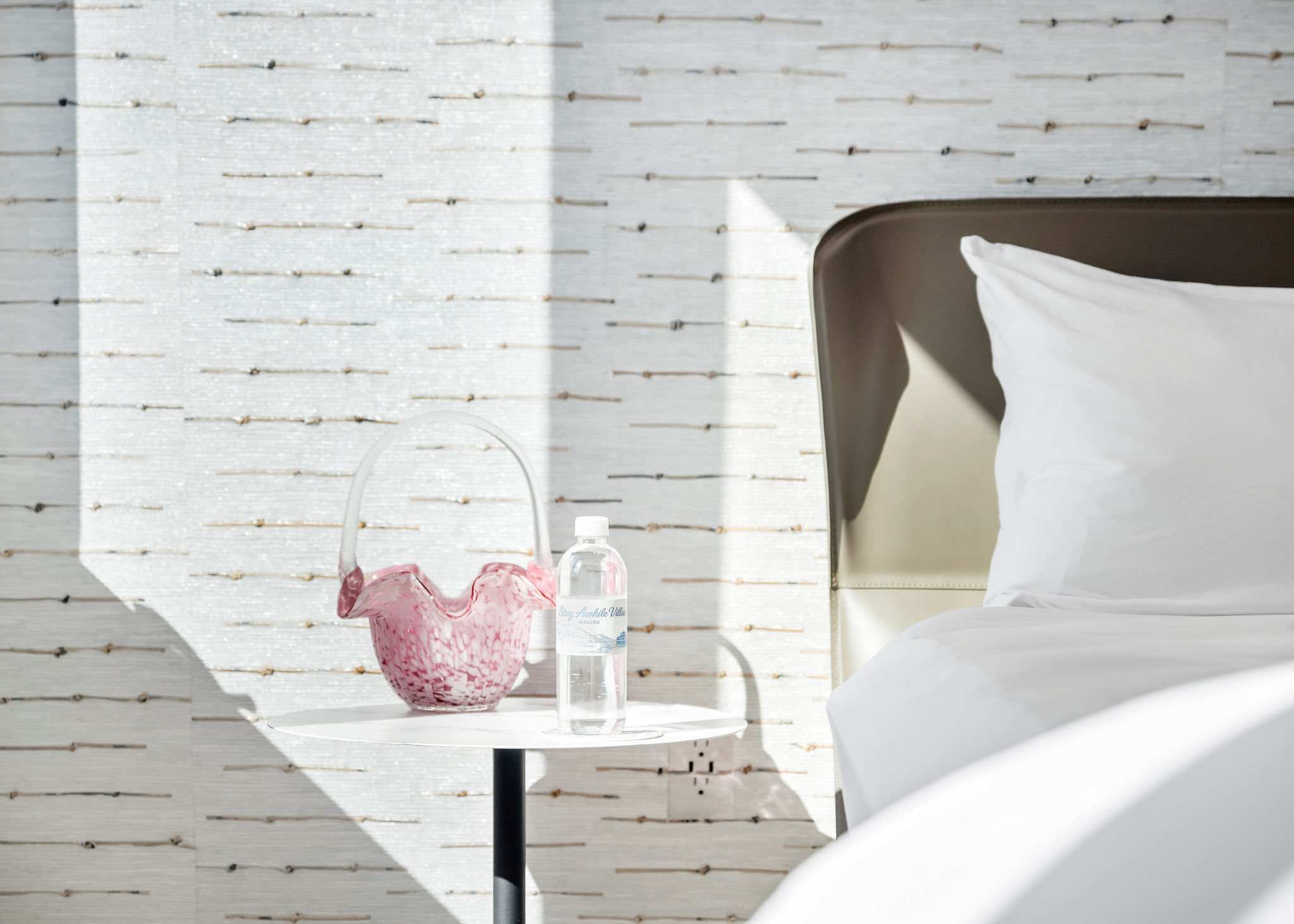 Settle in with everything within reach, from bedside surfaces to a fully laid-out bedroom space.