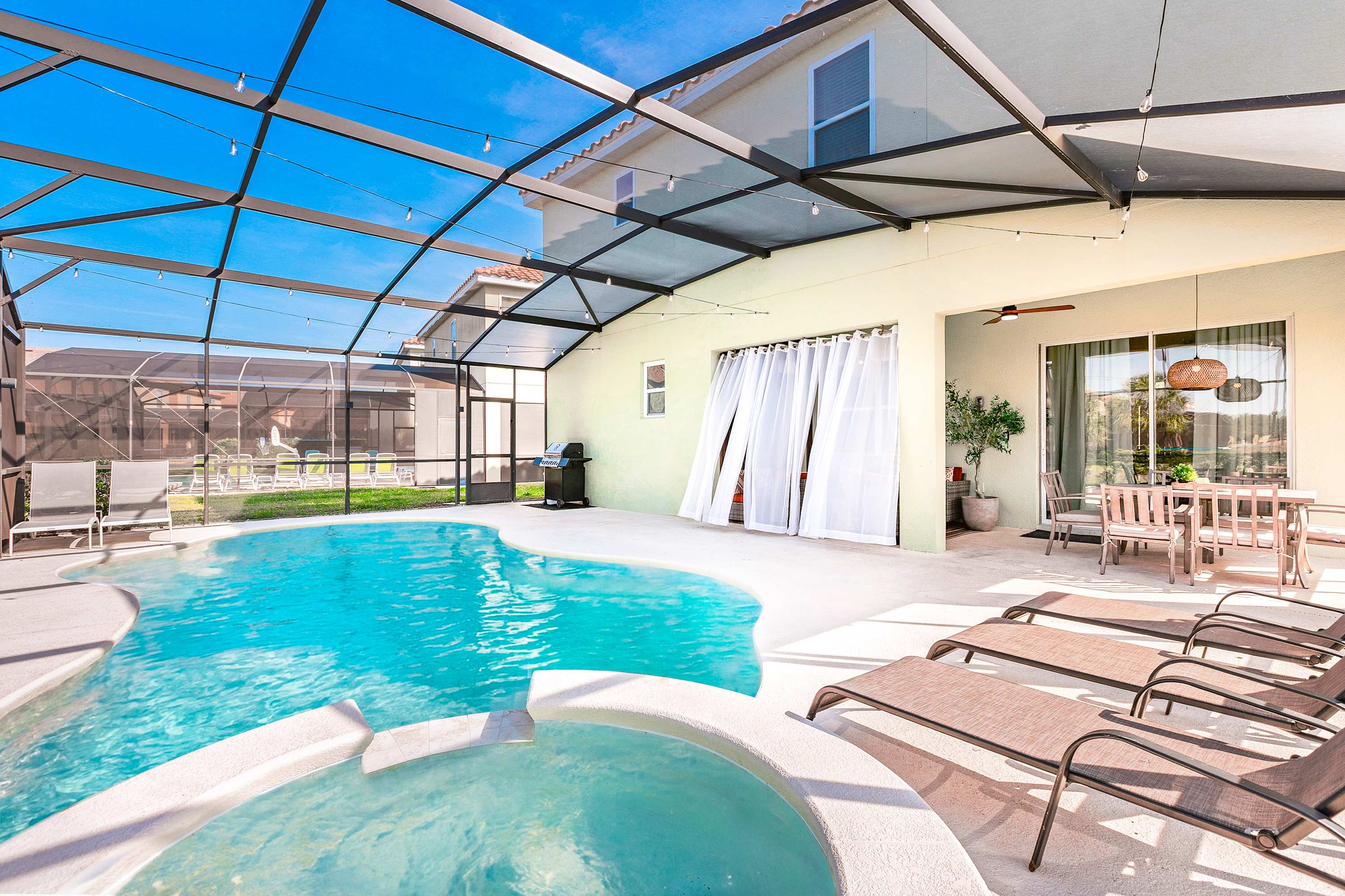 Private pool with direct access to the home and outdoor seating area.