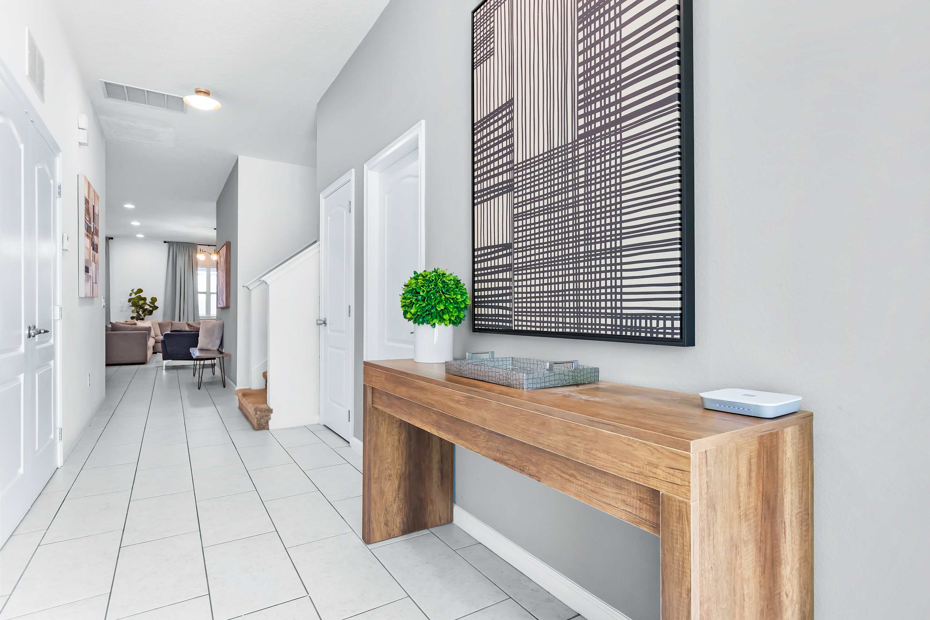Bright hallway with clean design and easy access to bedrooms.