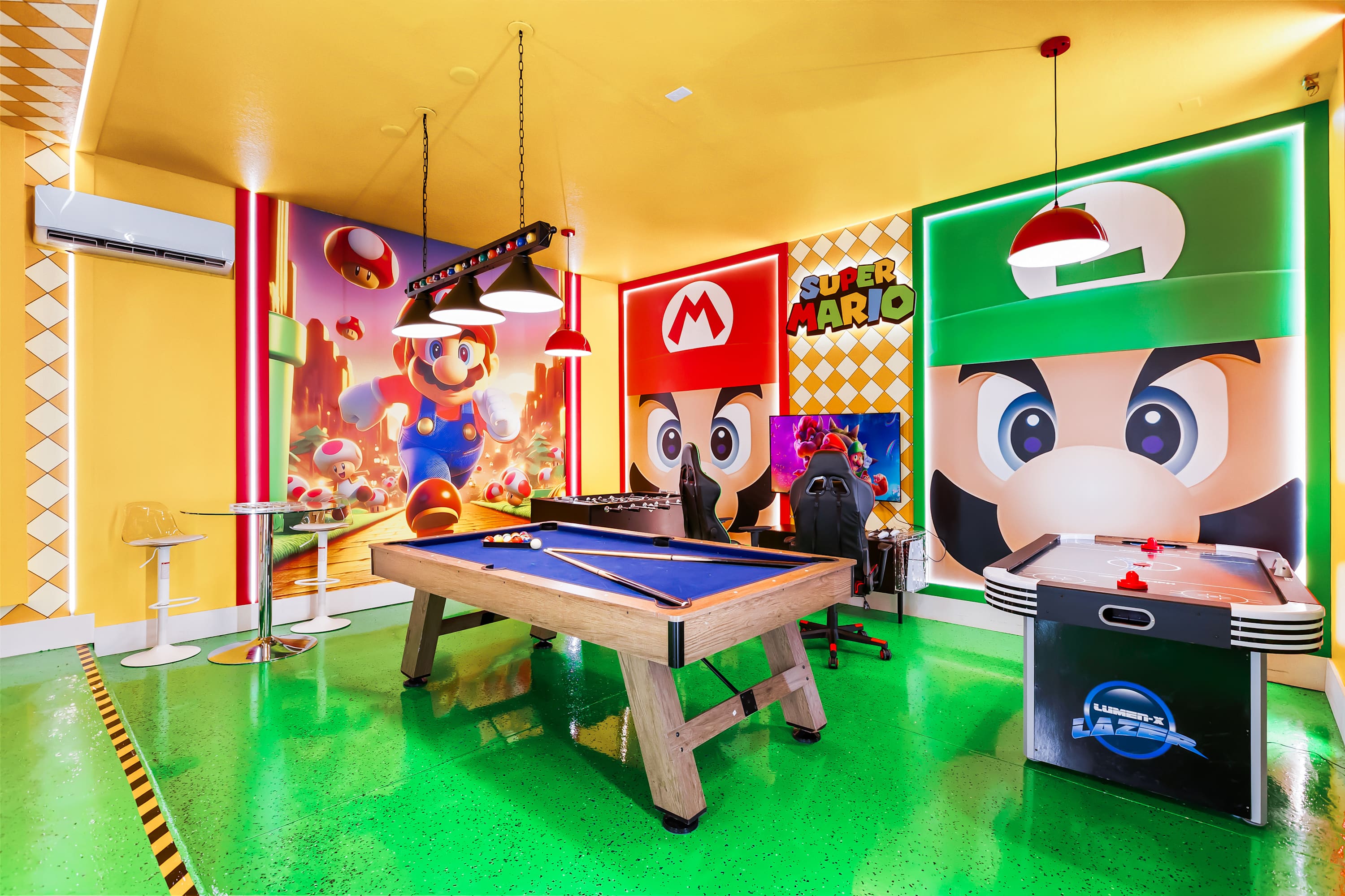 Super Mario themed game room with pool table and entertainment space.
