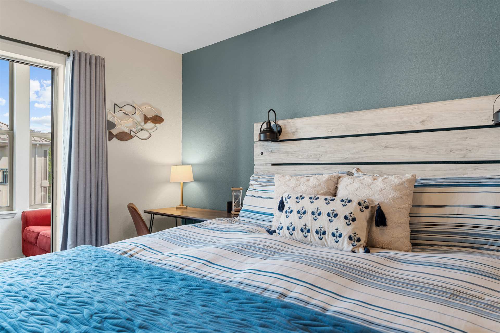 The primary king suite boasts sunroom access as well as a smart TV & ensuite​