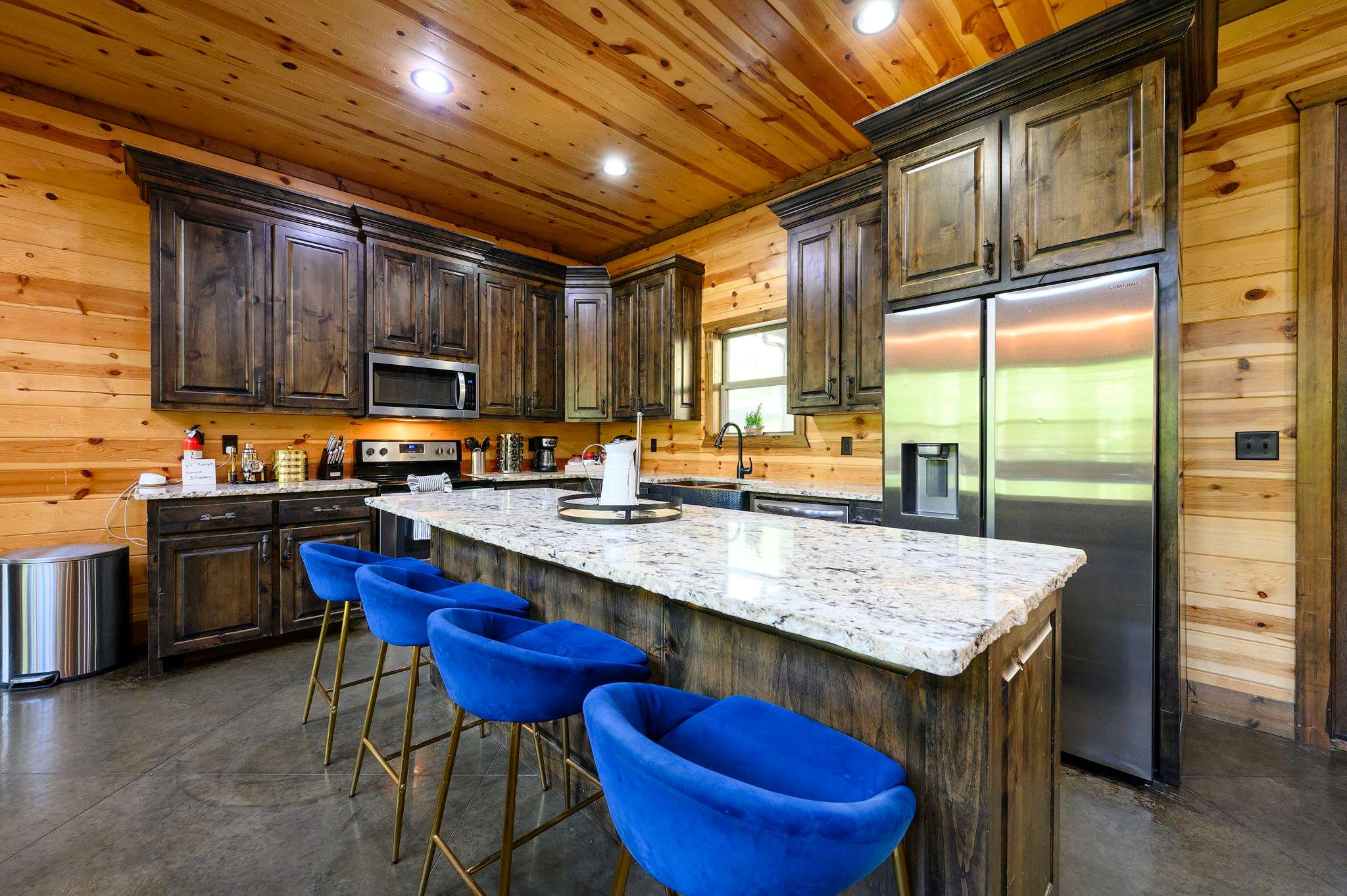 The open kitchen offers ample space & all the comforts of home​