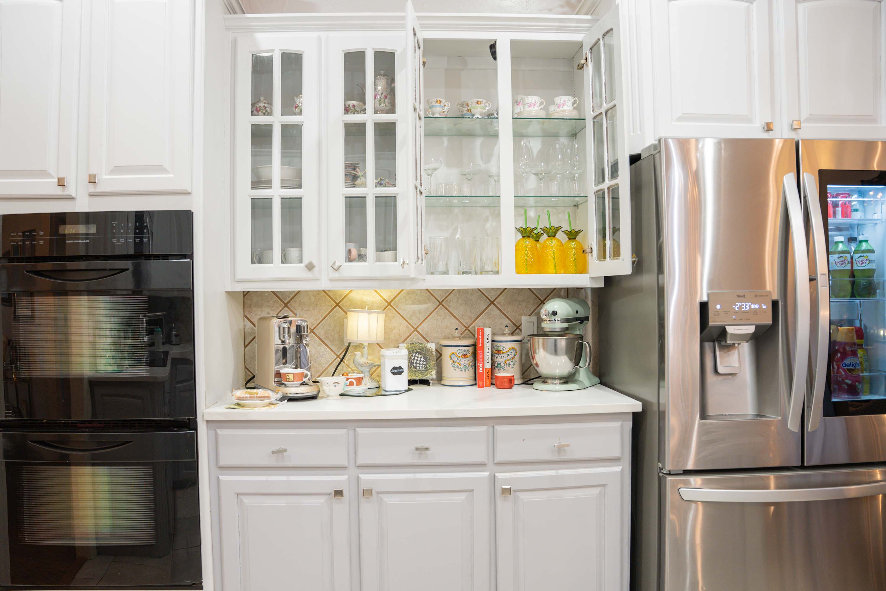 Full kitchen with counters, cabinets, and full size appliances