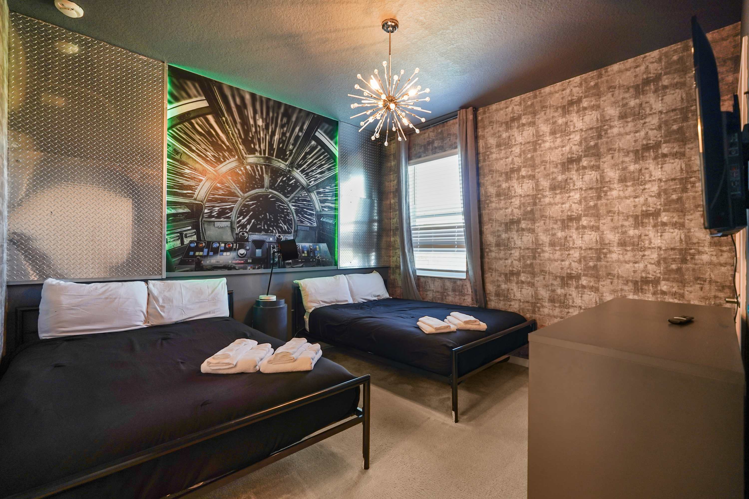 Immerse yourself in a sci-fi adventure in this uniquely themed bedroom, perfect for fans and families alike.