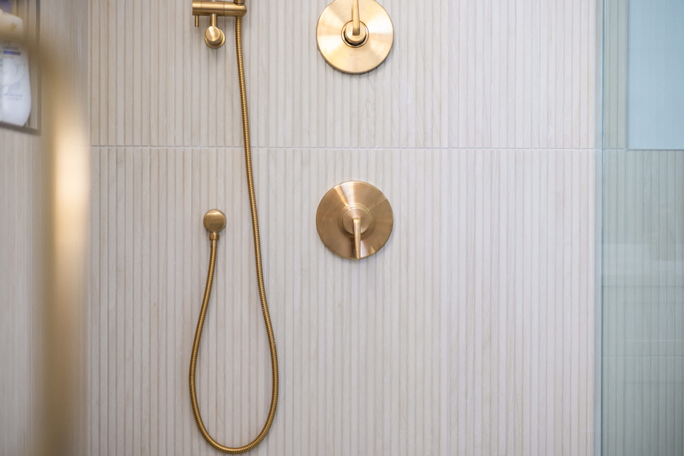 Rinse off in a sleek spa shower after days exploring the town.
