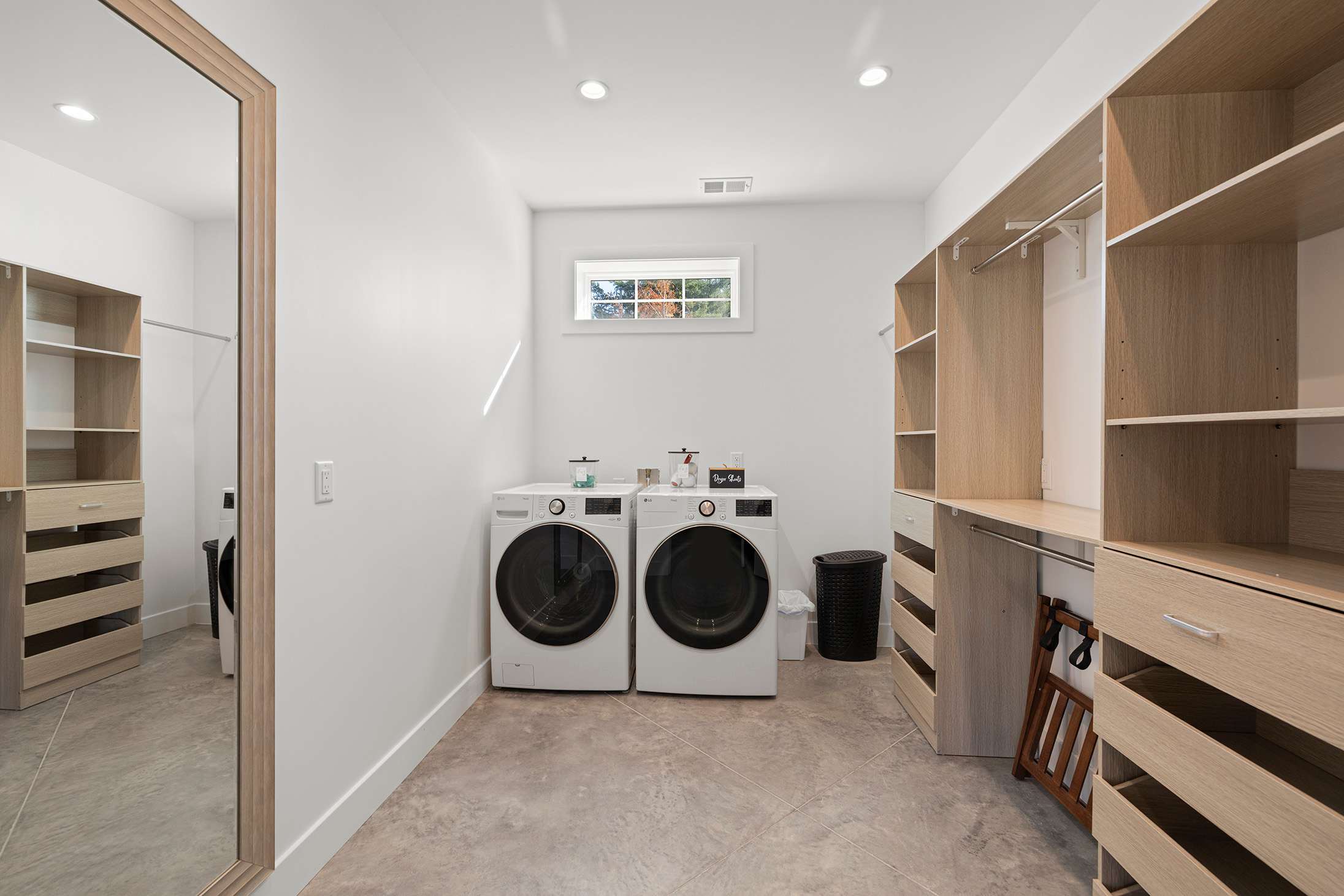 Tackle laundry with ease in this spacious upper level washroom.