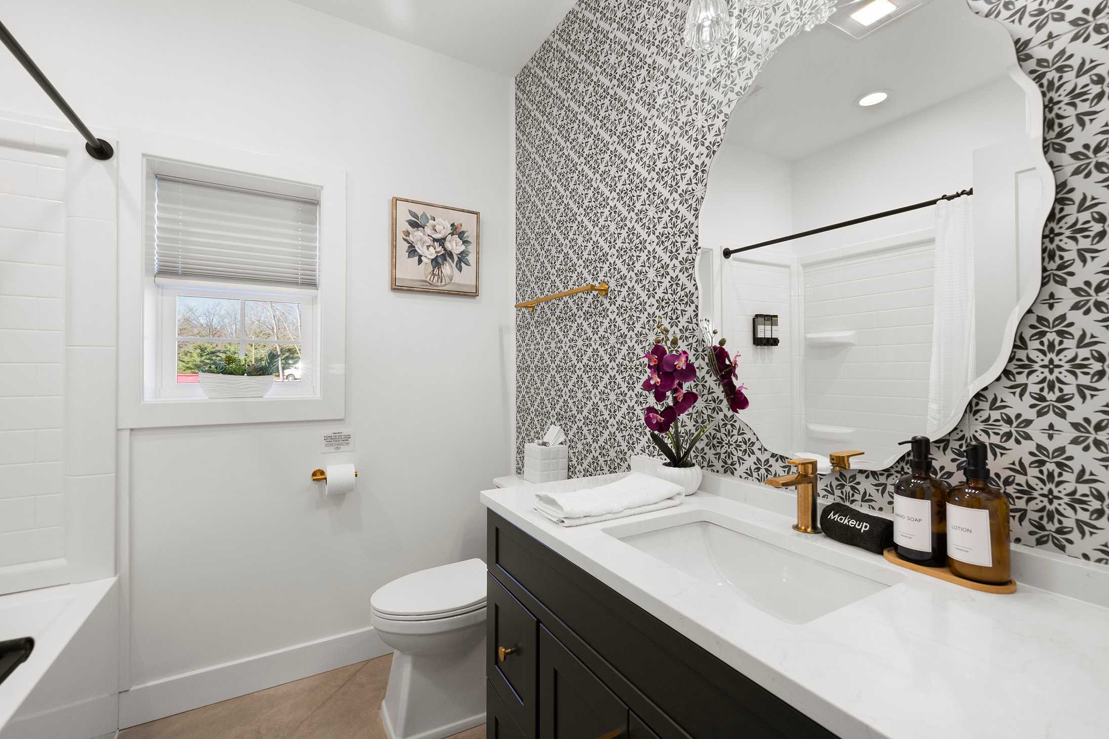 Stylish bath space offering comfort as you prepare for your day.