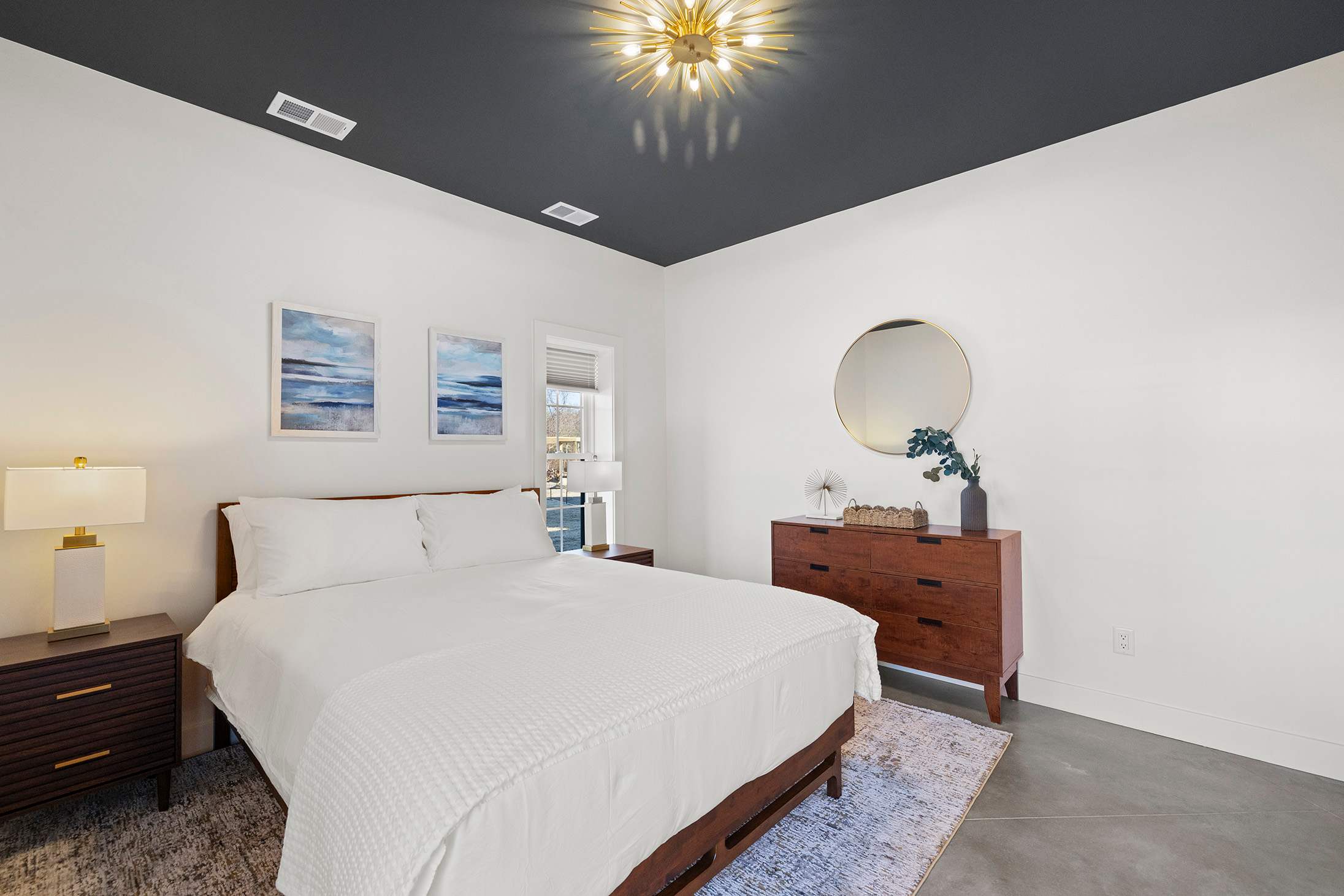 Calming bedroom escape where natural light and comfort take the lead.