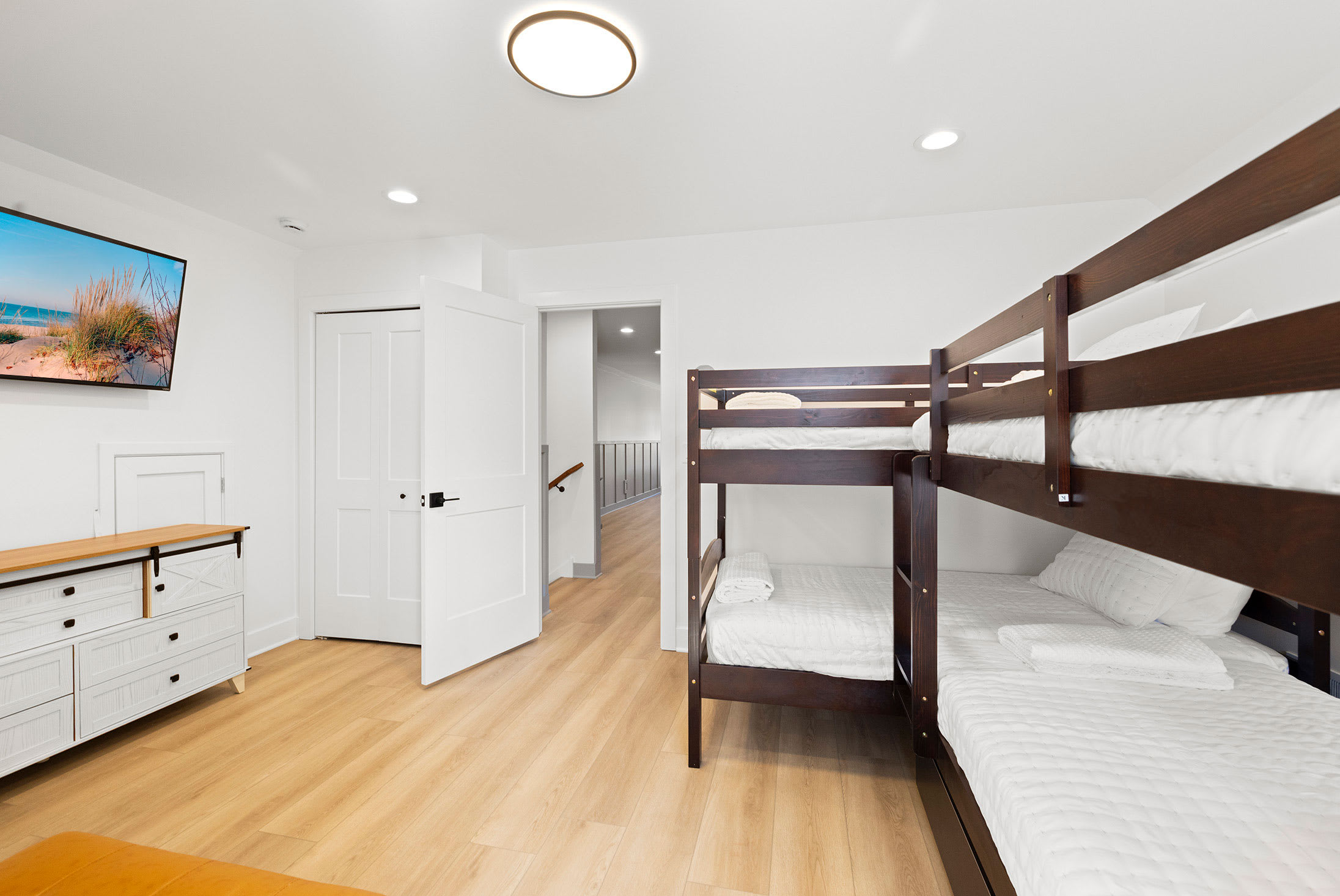 Bedroom 3 is on the lower level and has 2 twin bunk beds and a trundle bed.