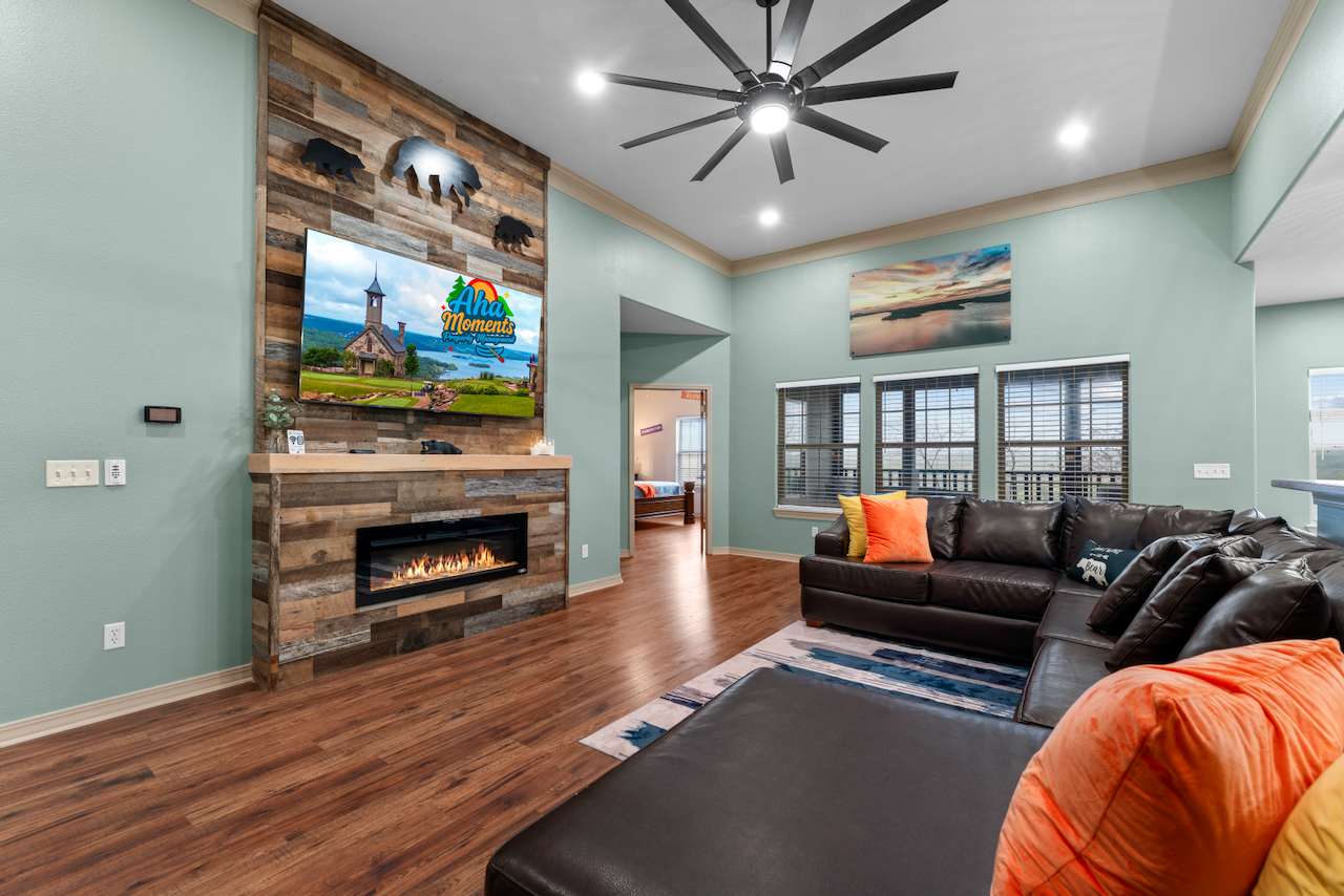 Enjoy evenings around the custom built one of a kind fireplace. Relax on the Comfy leather sectional.