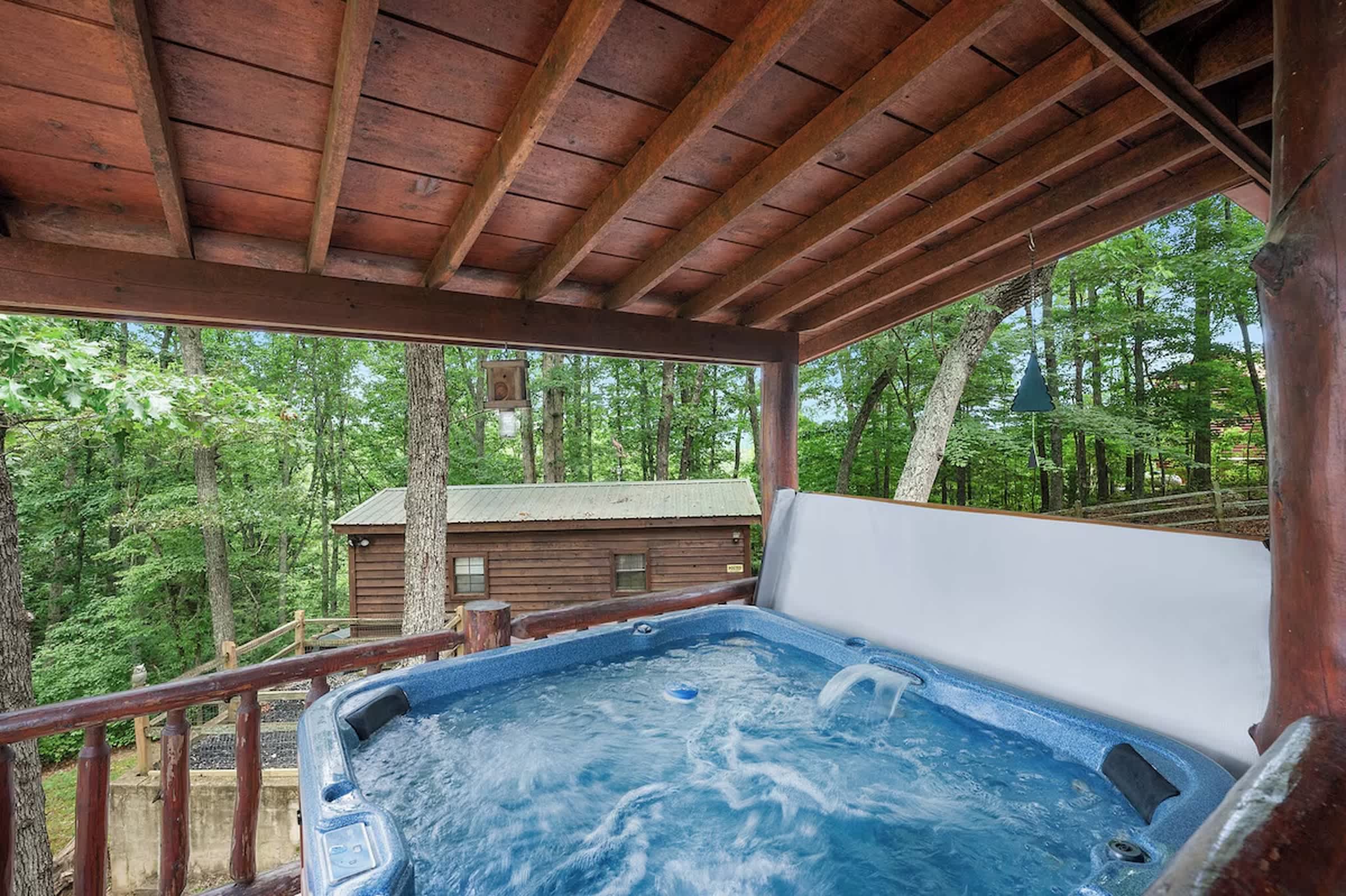 Bask in bubbling bliss in the private hot tub​