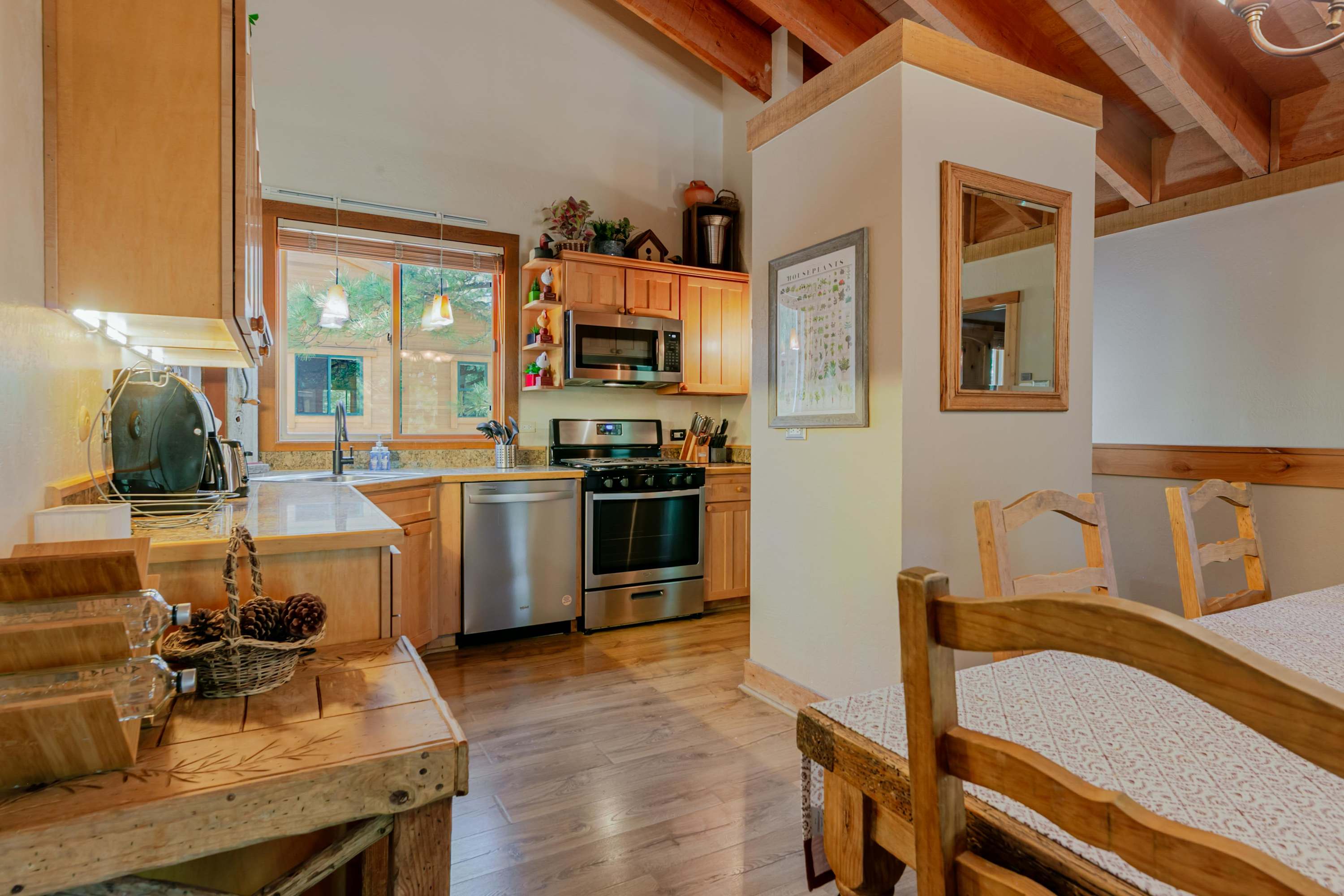 The open kitchen offers ample space & all the comforts of home​