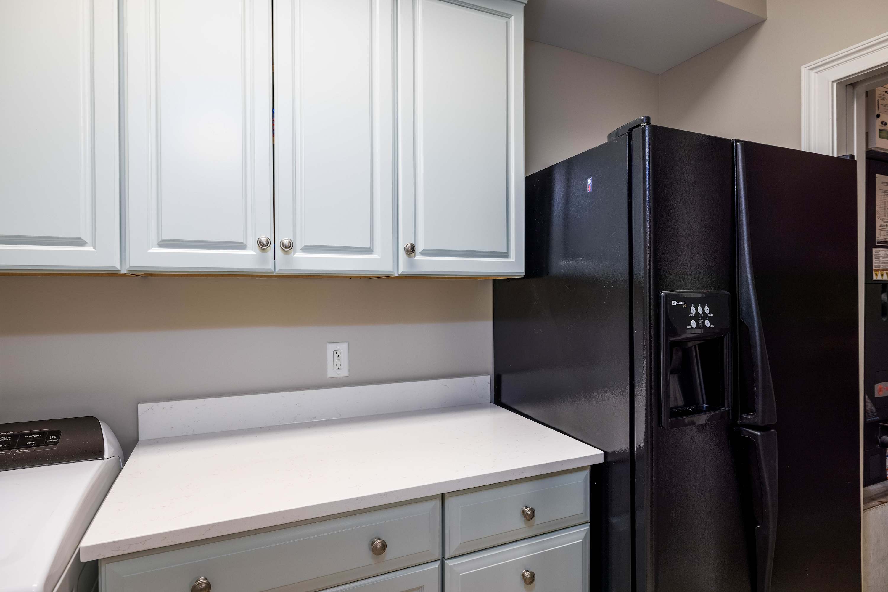 Laundry Room with Extra Refrigerator