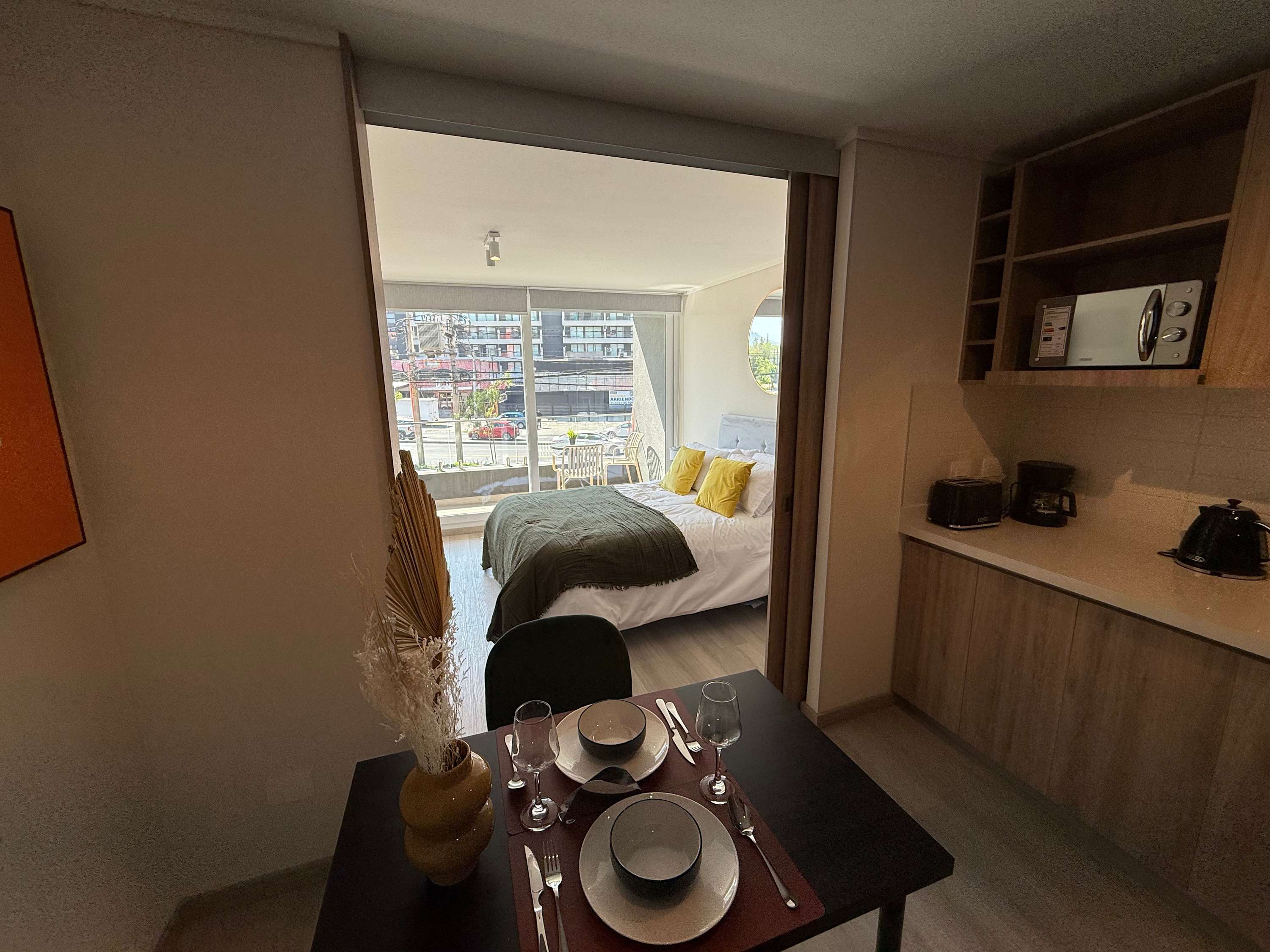 Cozy studio with city views, modern amenities, and a well-equipped kitchenette for a comfortable stay.