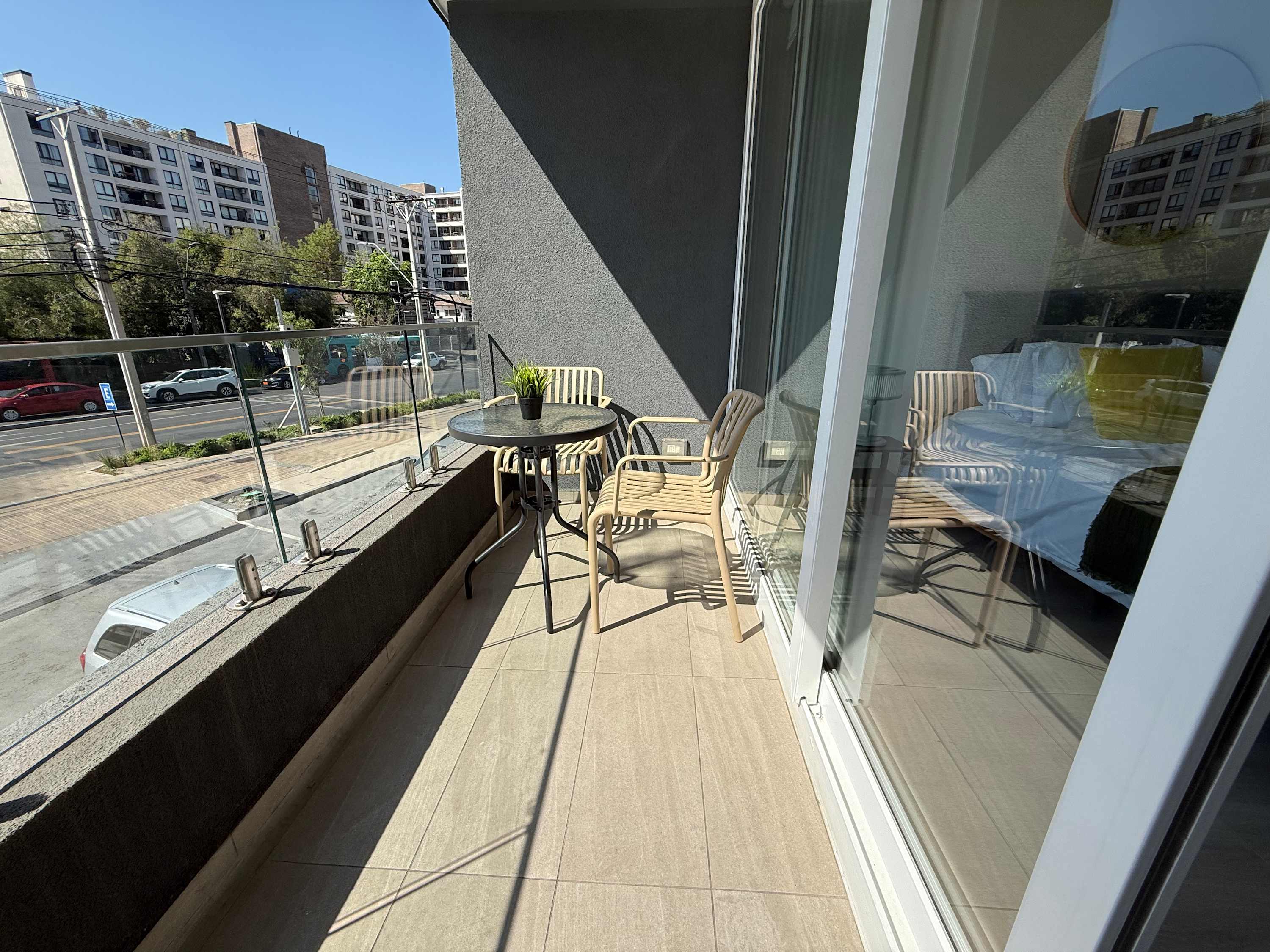 Relax on your private balcony with city views, perfect for morning coffee or evening relaxation.