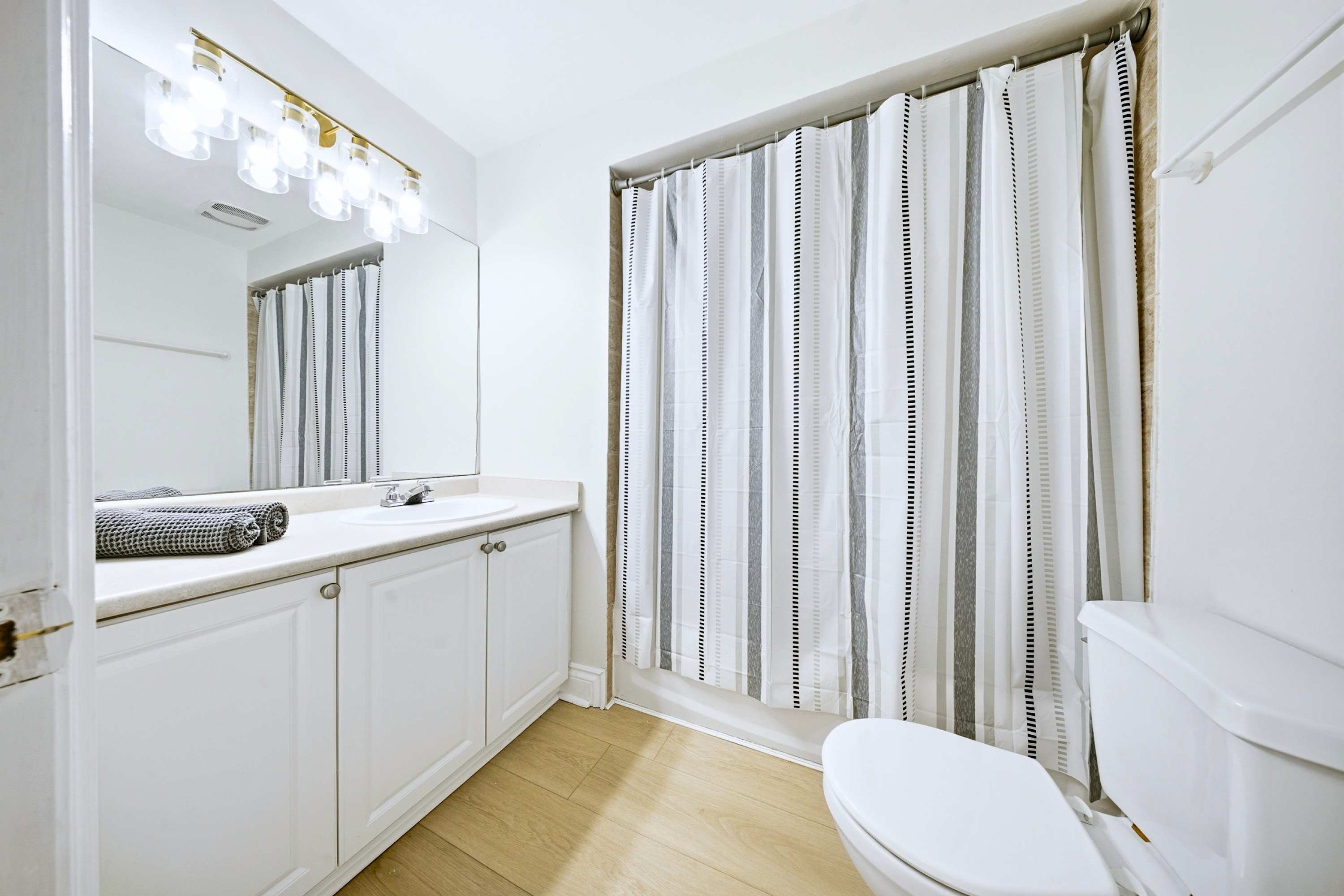 Bathroom with walk in shower and bathtub for comfort and relaxation