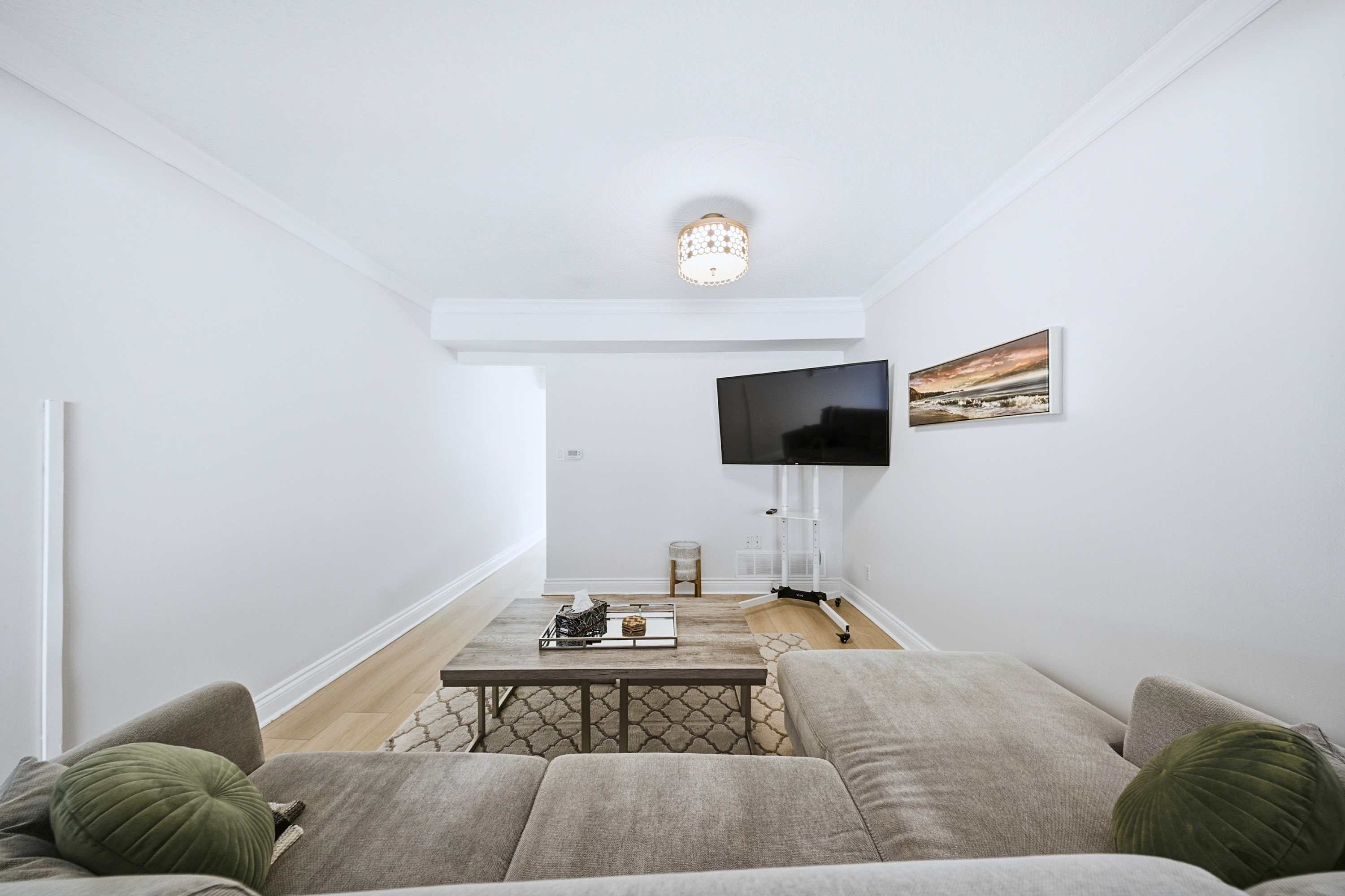 Comfortable living room with TV and cozy seating for relaxing evenings