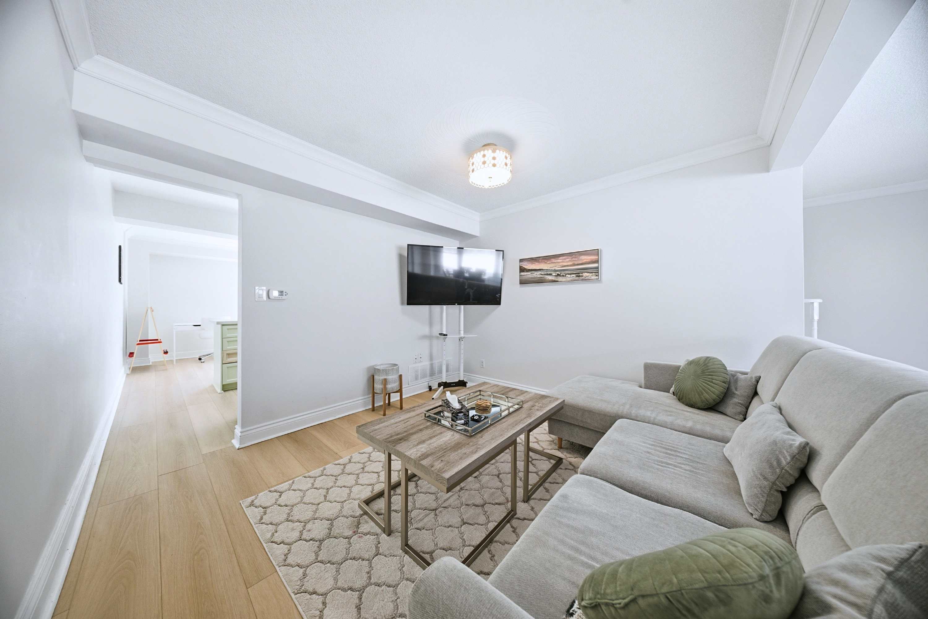 Spacious living room flowing into dining area