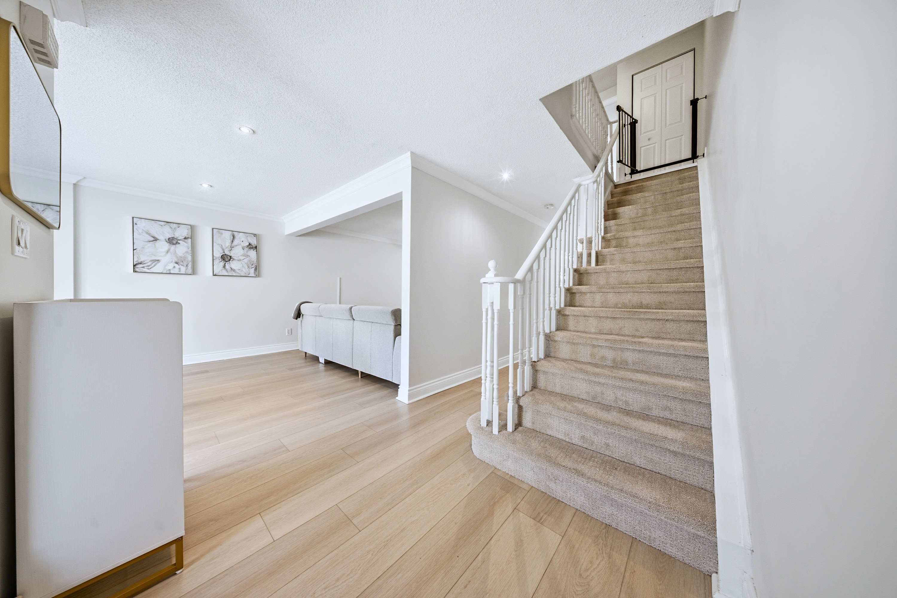 Easy flow from entrance into living space and upstairs