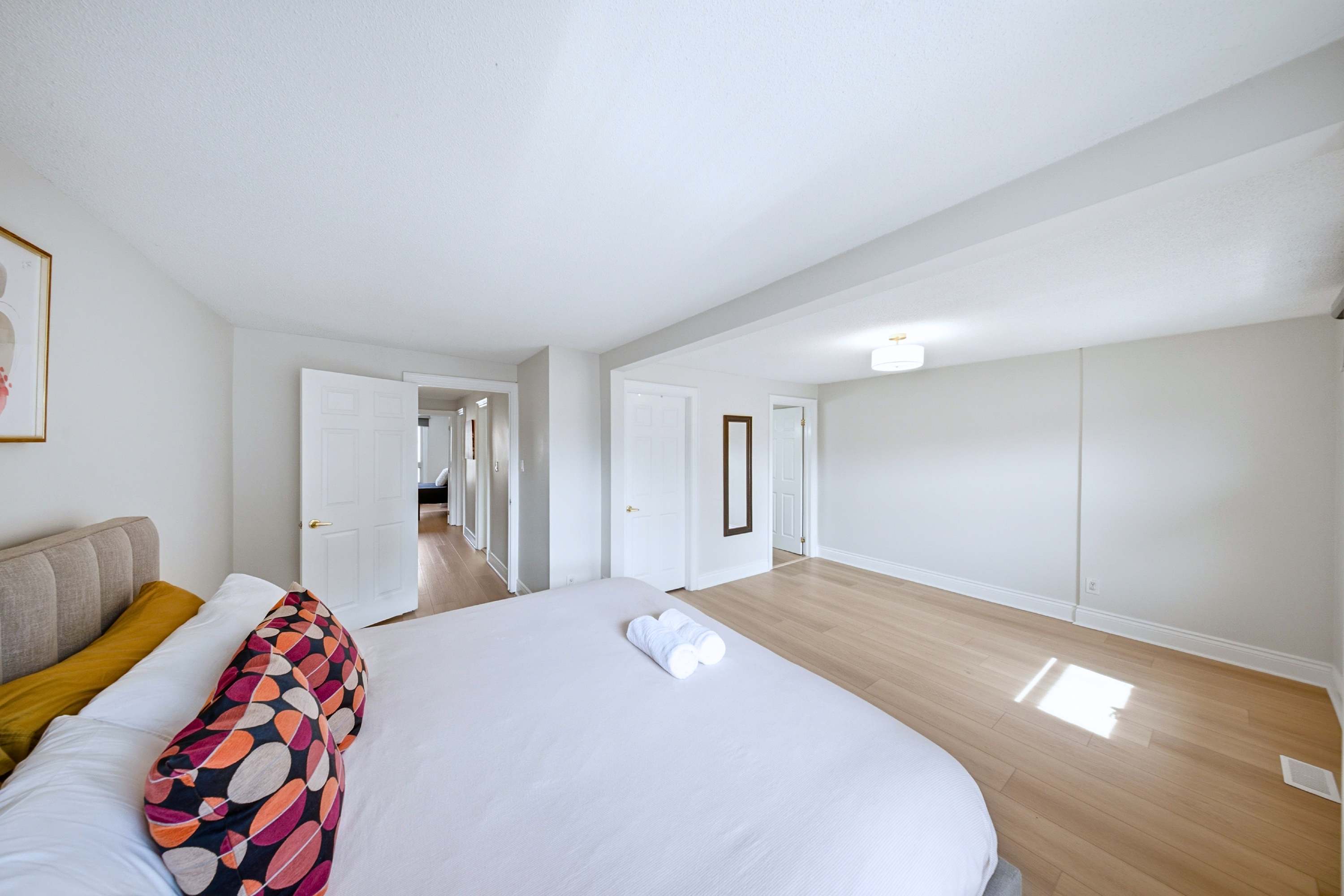 Spacious bedroom with king bed and comfortable open layout