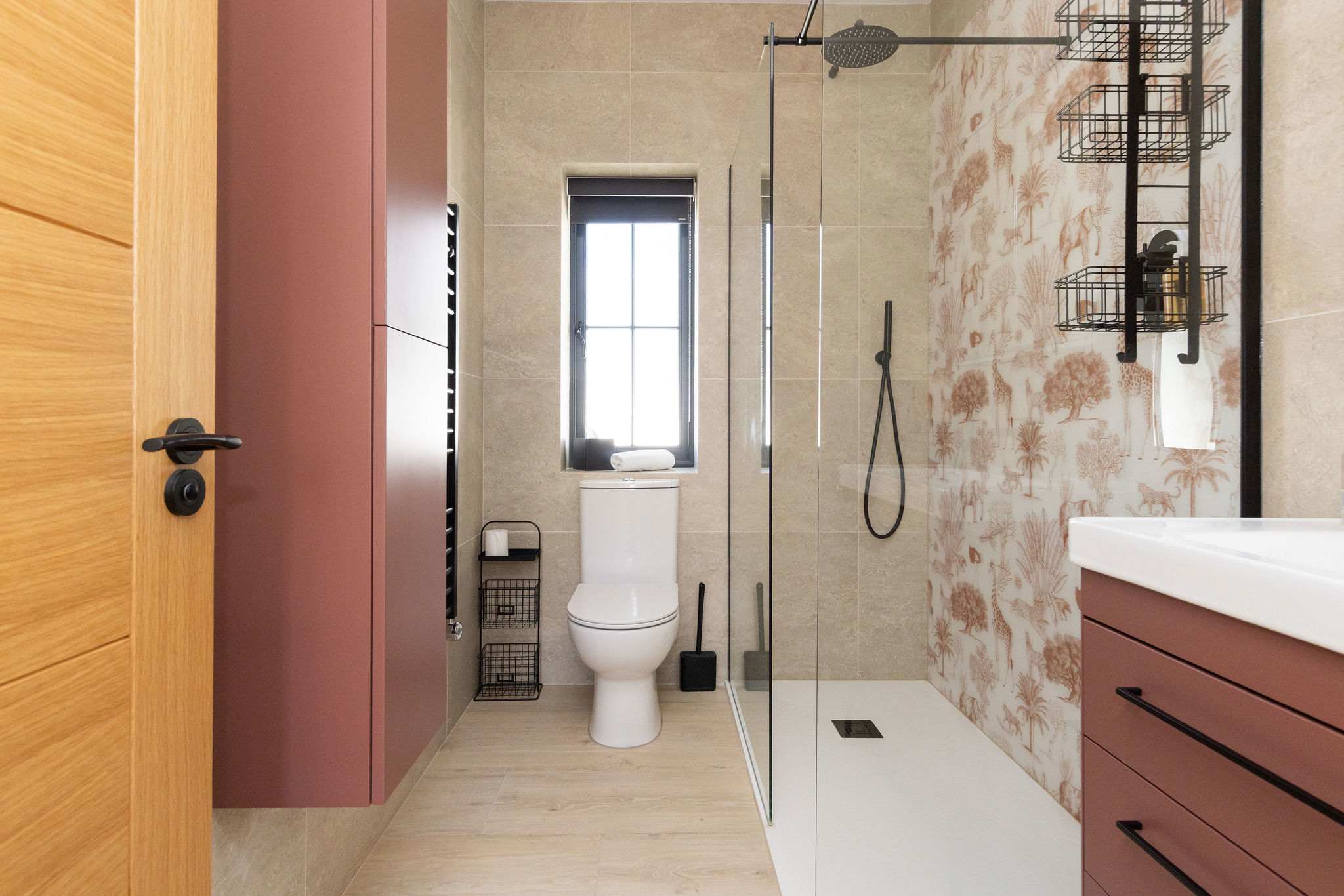 Refresh after countryside walks in an elegant ensuite, complete with walk-in shower and earthy modern tones.