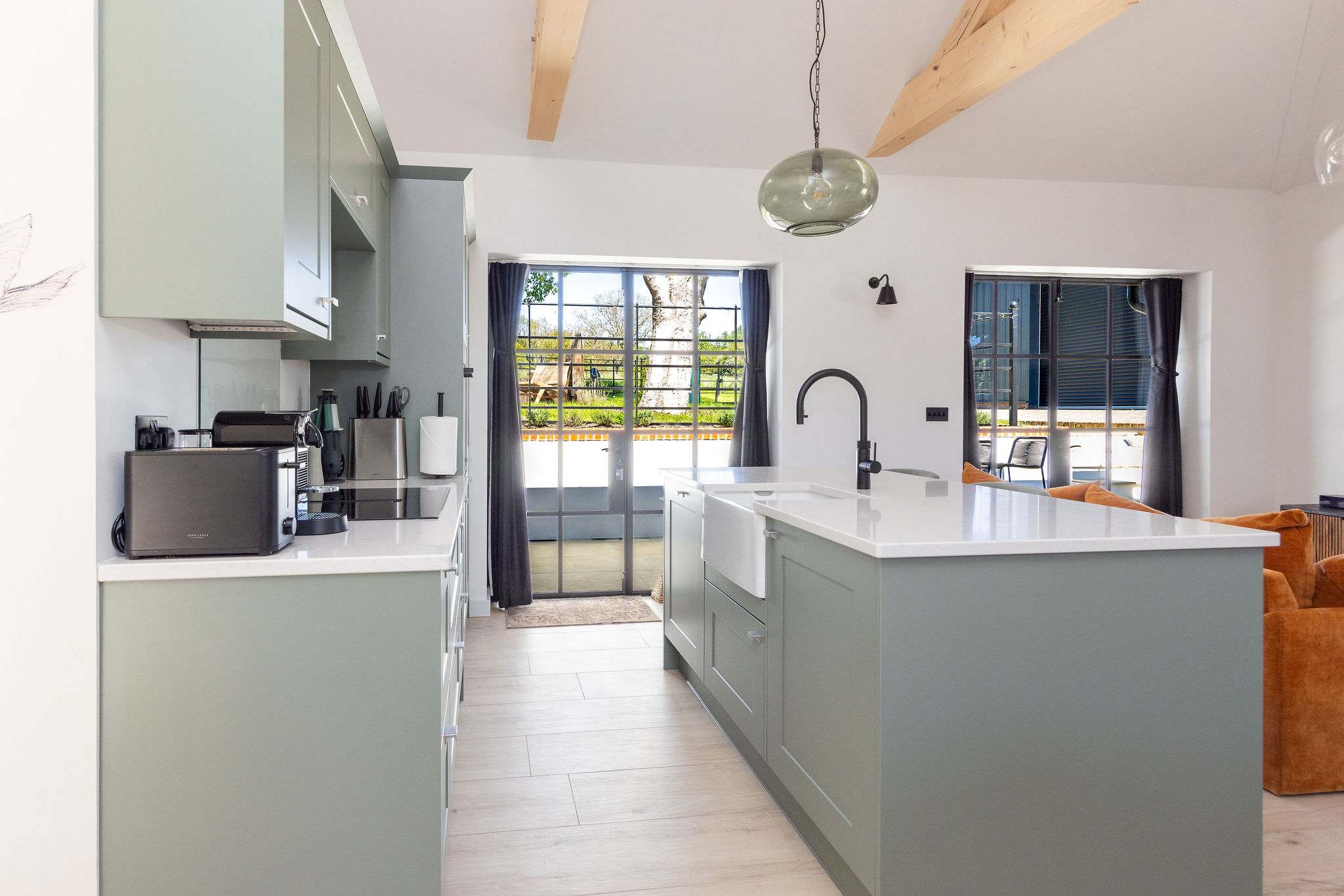 Enjoy a bright modern kitchen, ideal for slow breakfasts before exploring Chichester, Goodwood, and the coast.