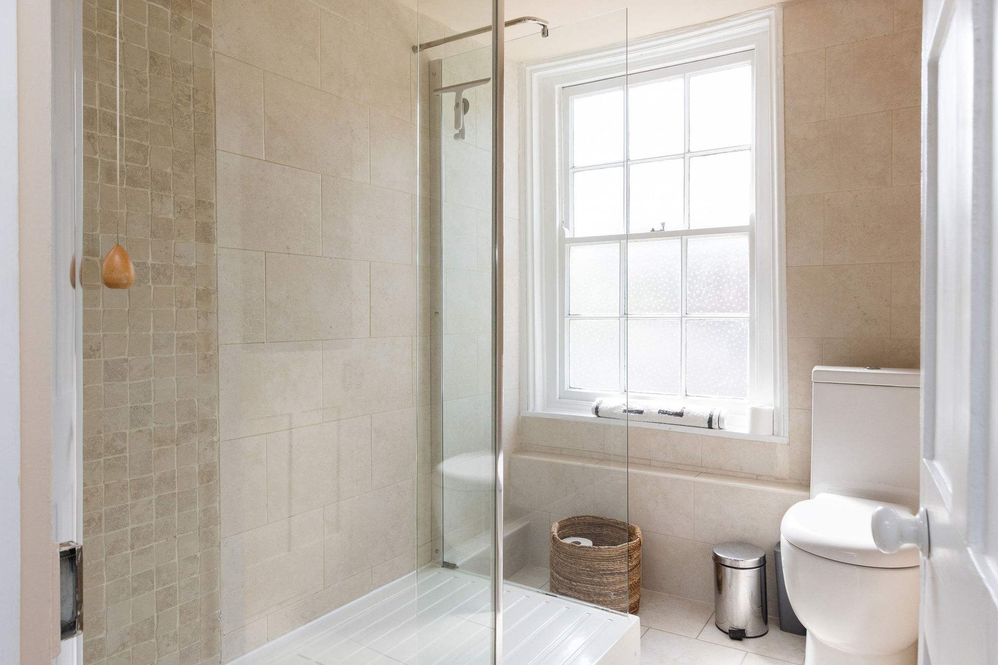 Bright family shower room with clean modern finish