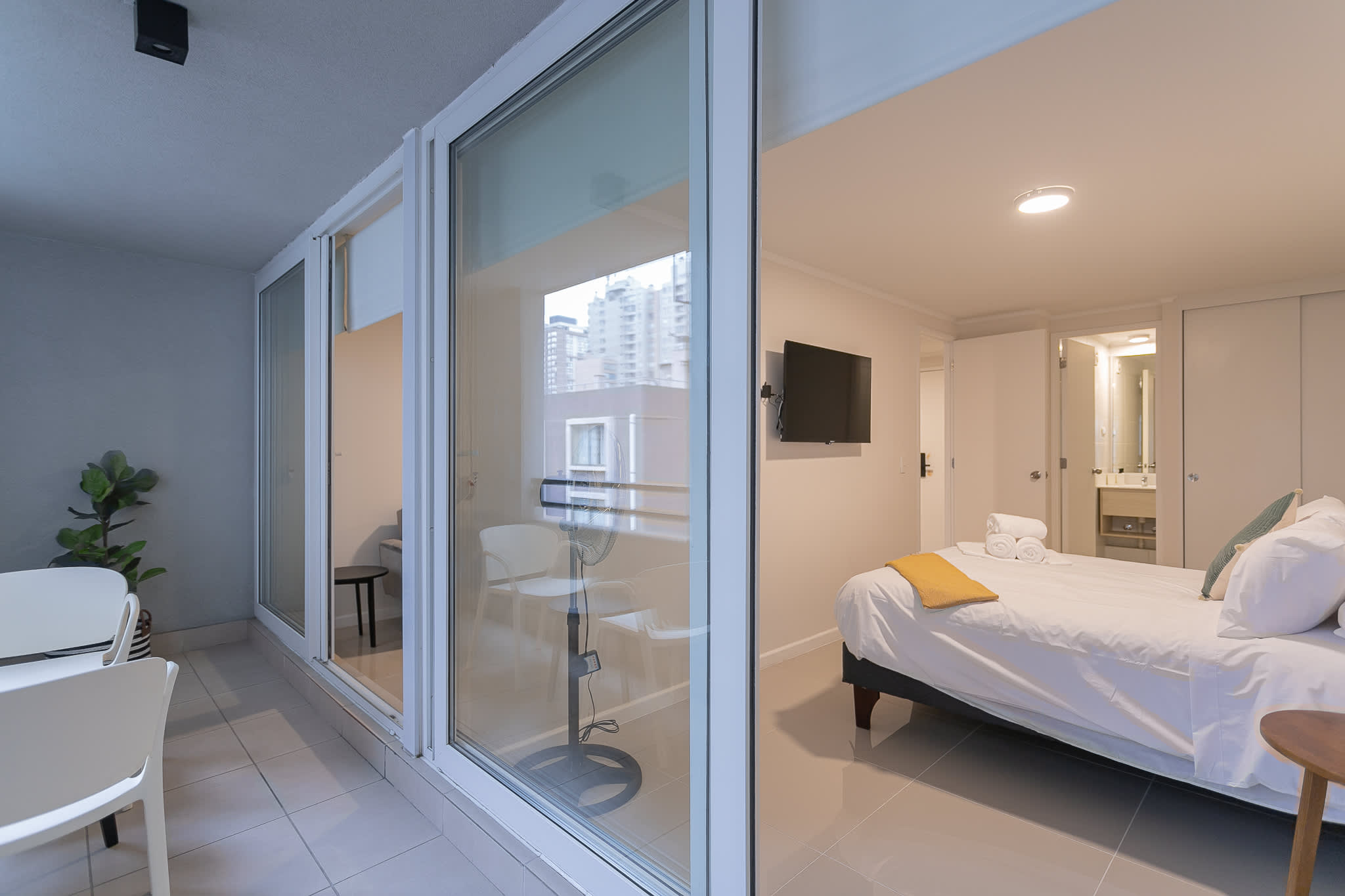 Enjoy a cozy retreat with a private balcony and modern amenities, perfect for a relaxing stay in the heart of the city.