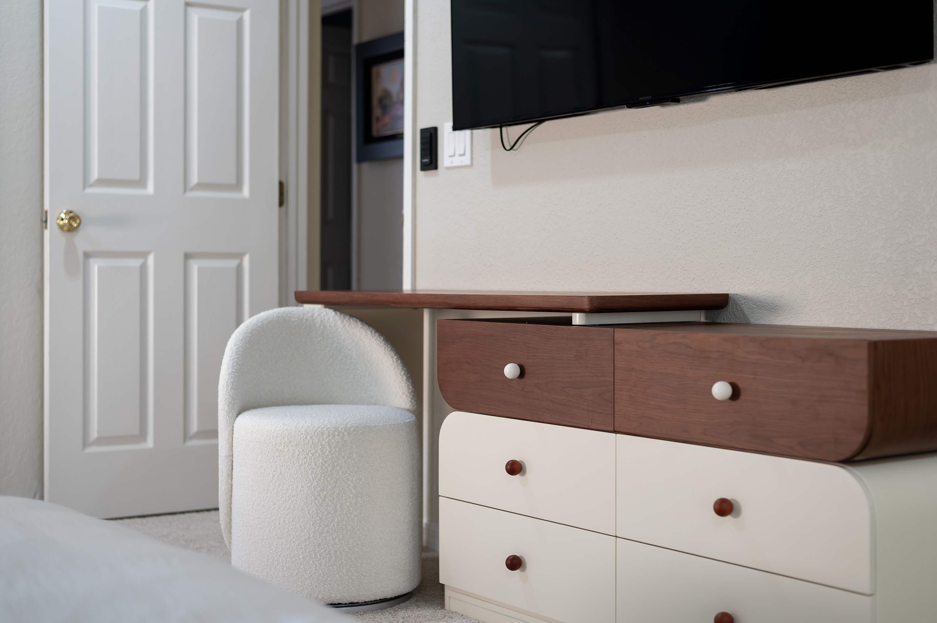 Bedroom w/ dresser storage & TV for added comfort