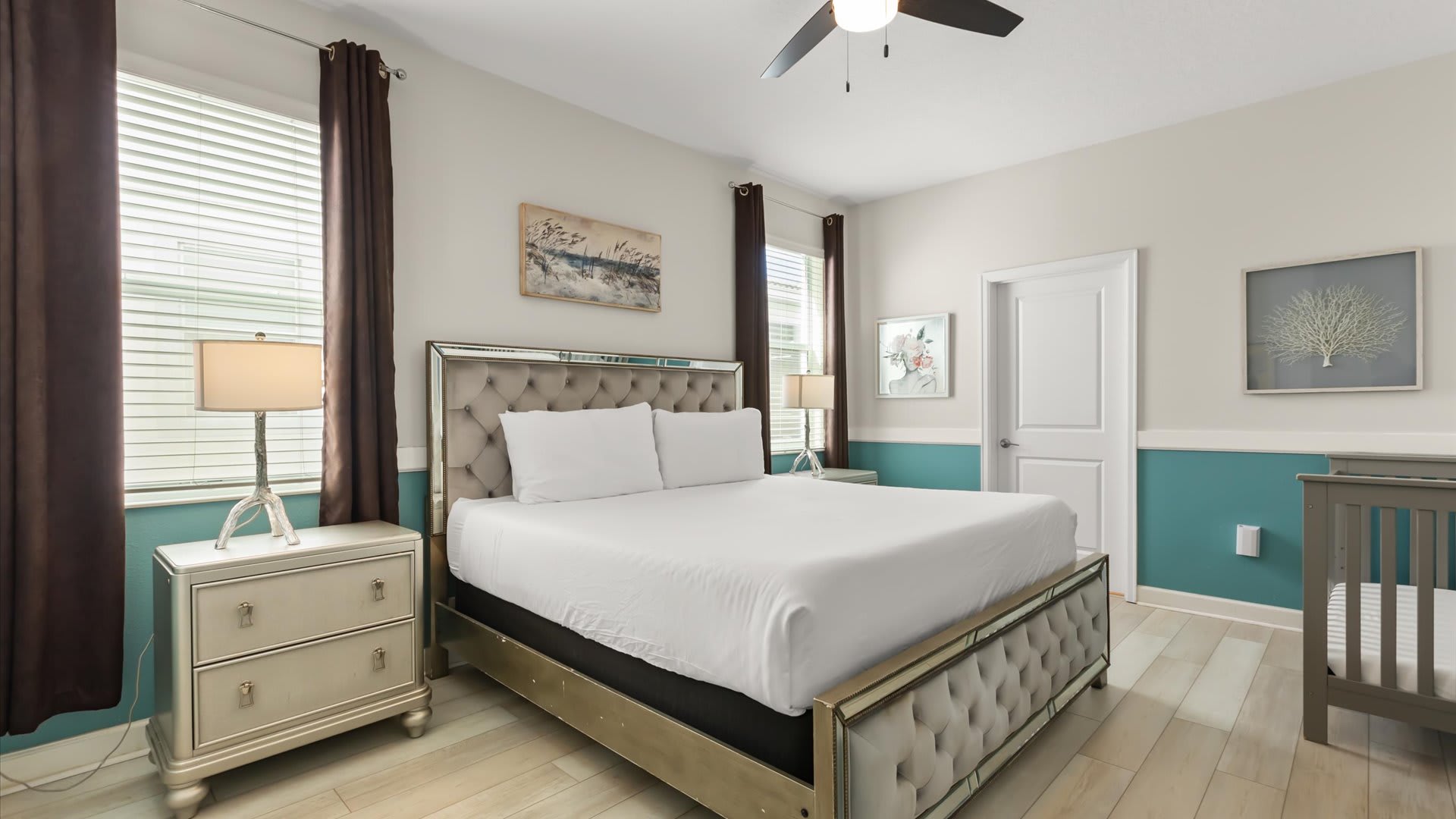 King bed and crib, designed for families and a comfortable stay.