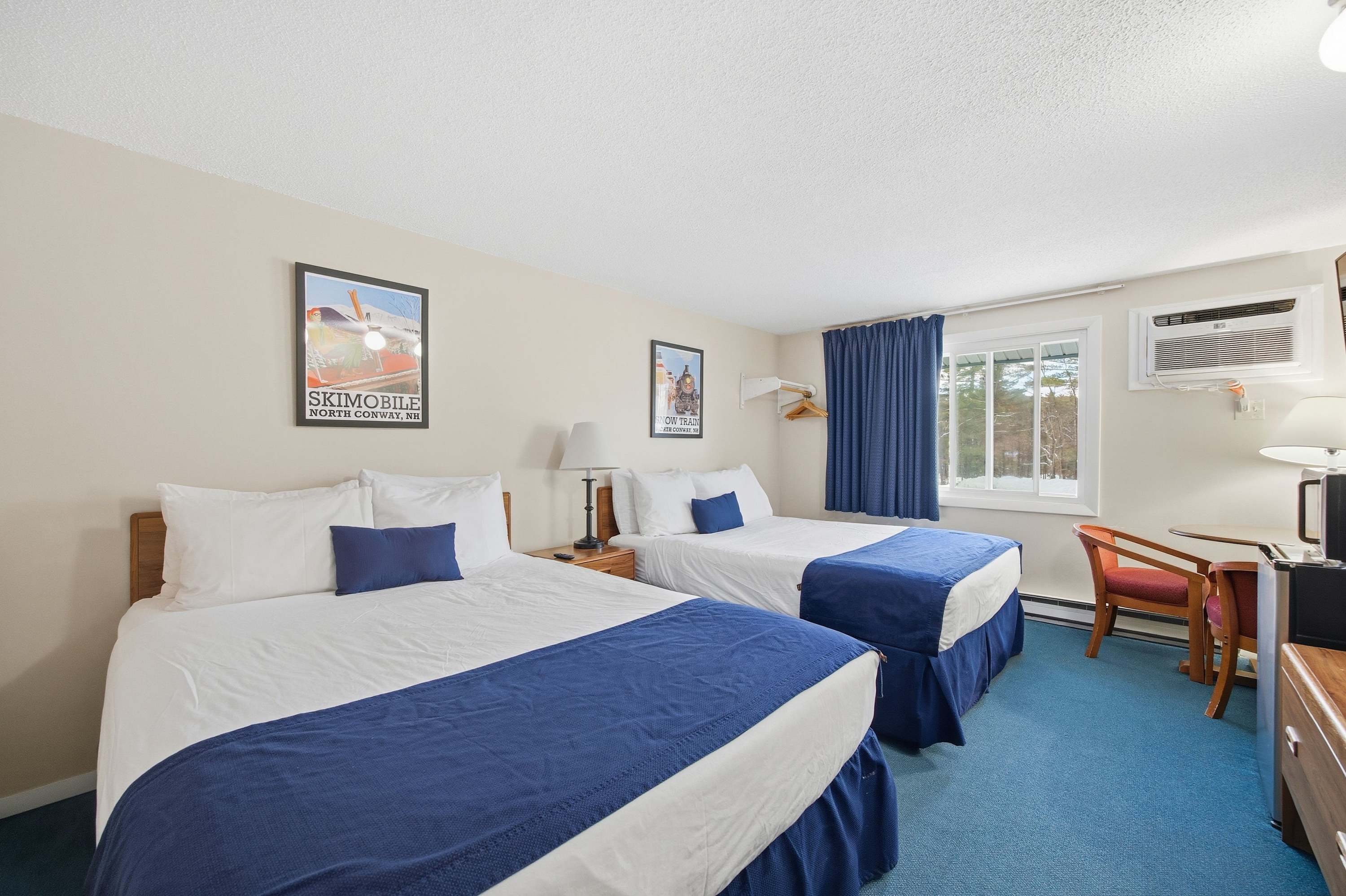 Unwind in one of this studio-style suite’s plush queen beds after a day on the town​