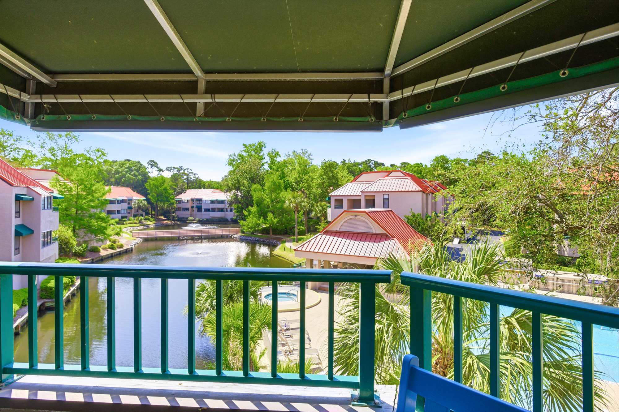 Wake up to lagoon views, fountain sounds, and lush Lowcountry greenery from your private balcony - a soundtrack of birdsong included.