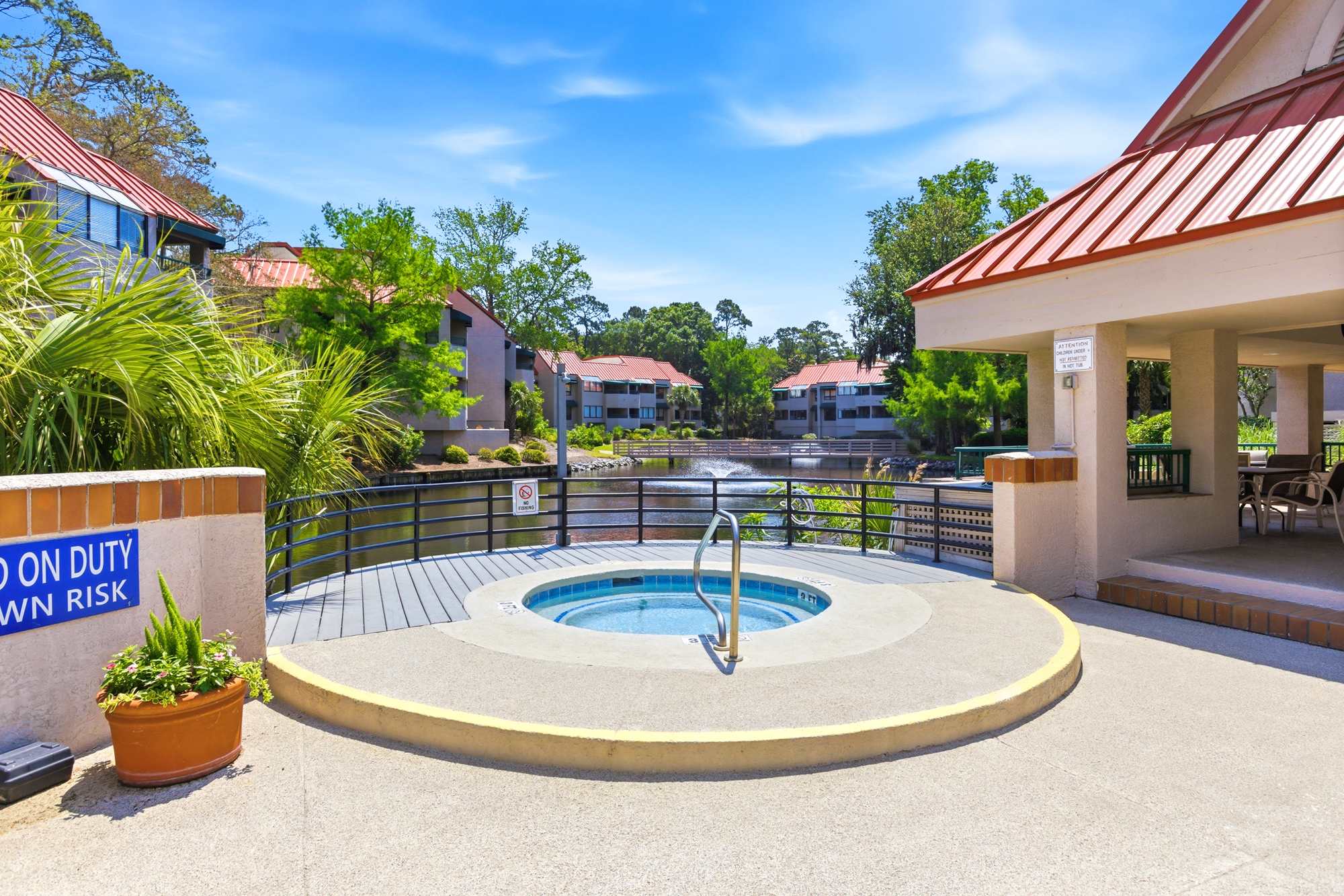 Heated community hot tub overlooking the lagoon - soak in the bubbles while the fountain hums in the distance.