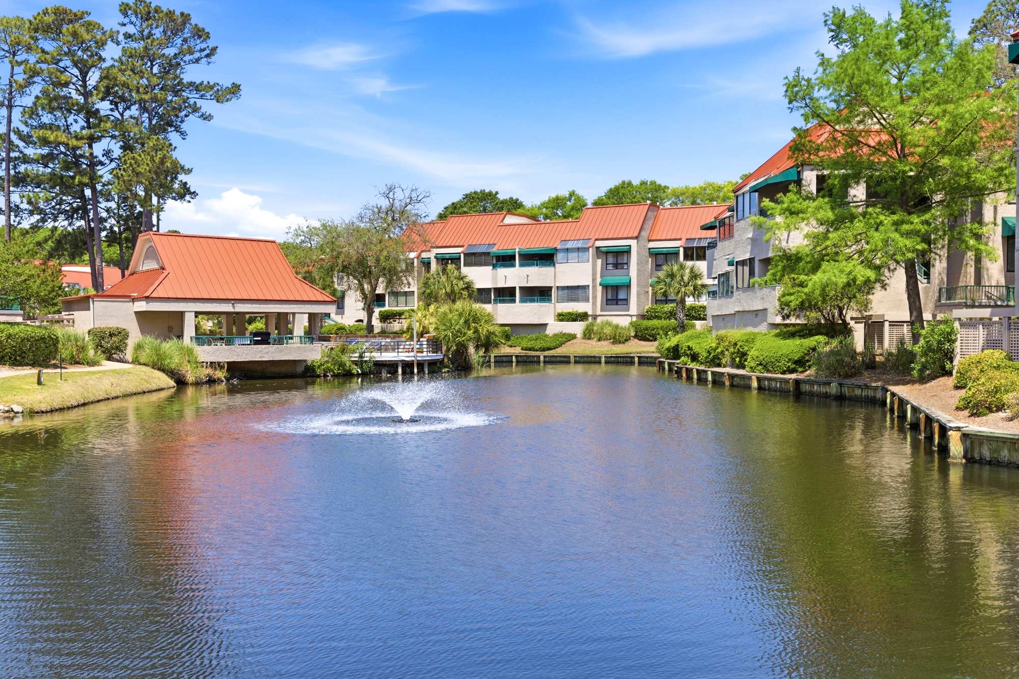 Tranquil pond views with the iconic community fountain - a peaceful centerpiece you'll see (and hear) throughout your visit.
