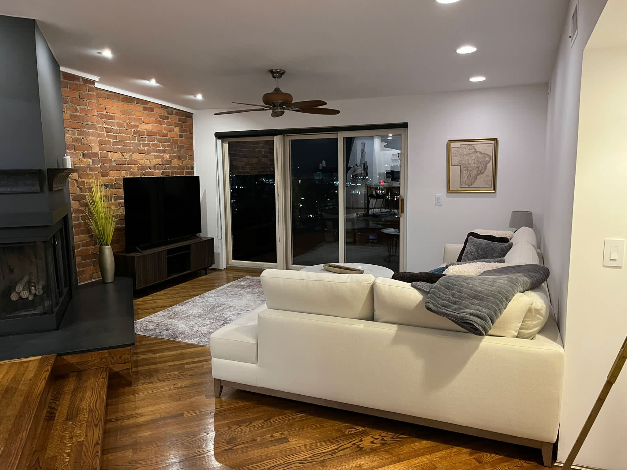 Curl up in the chic living room & stream your favorites on the smart TV​