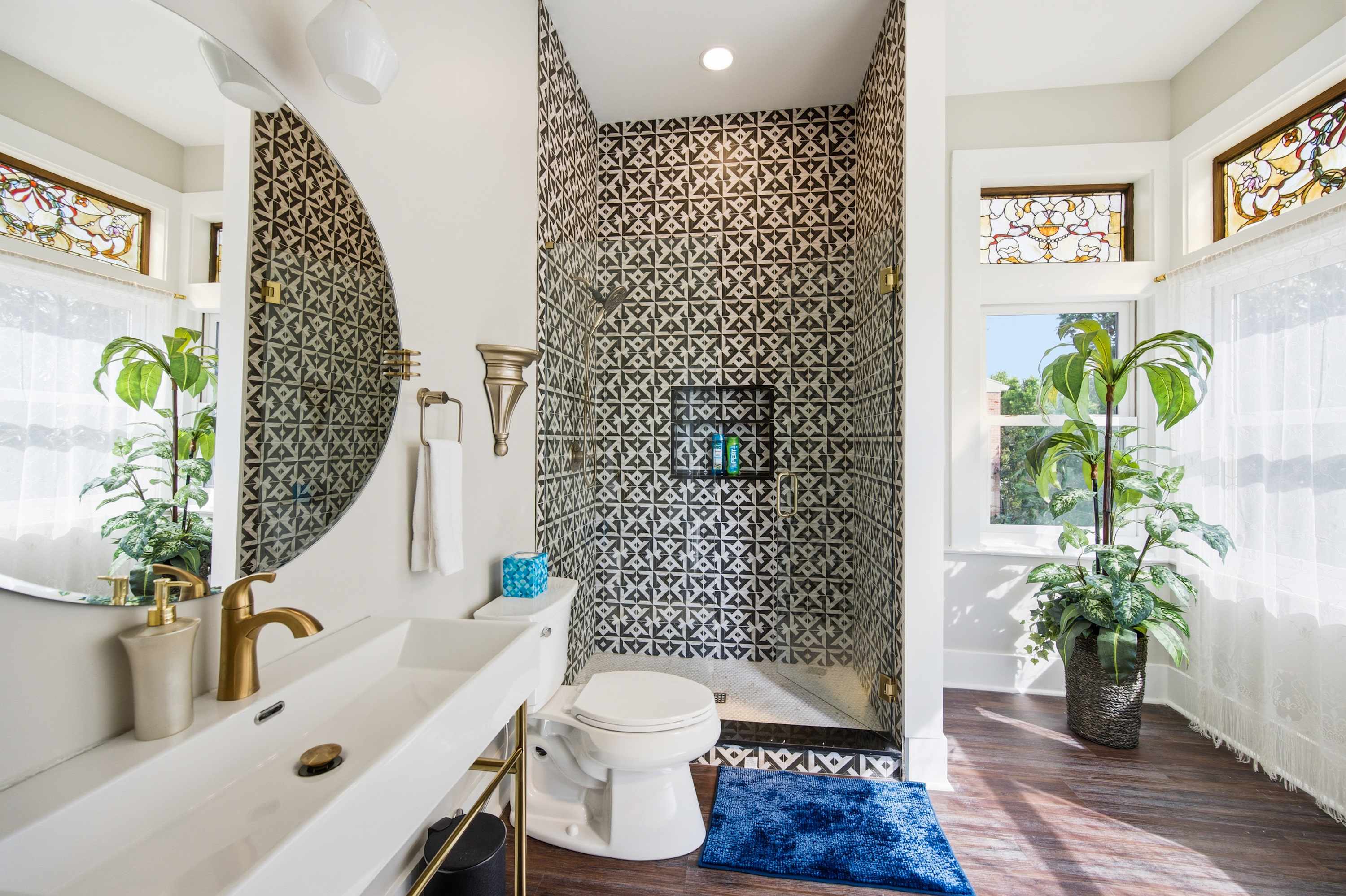 A stylish single vanity & tiled shower await in the sophisticated ensuite​