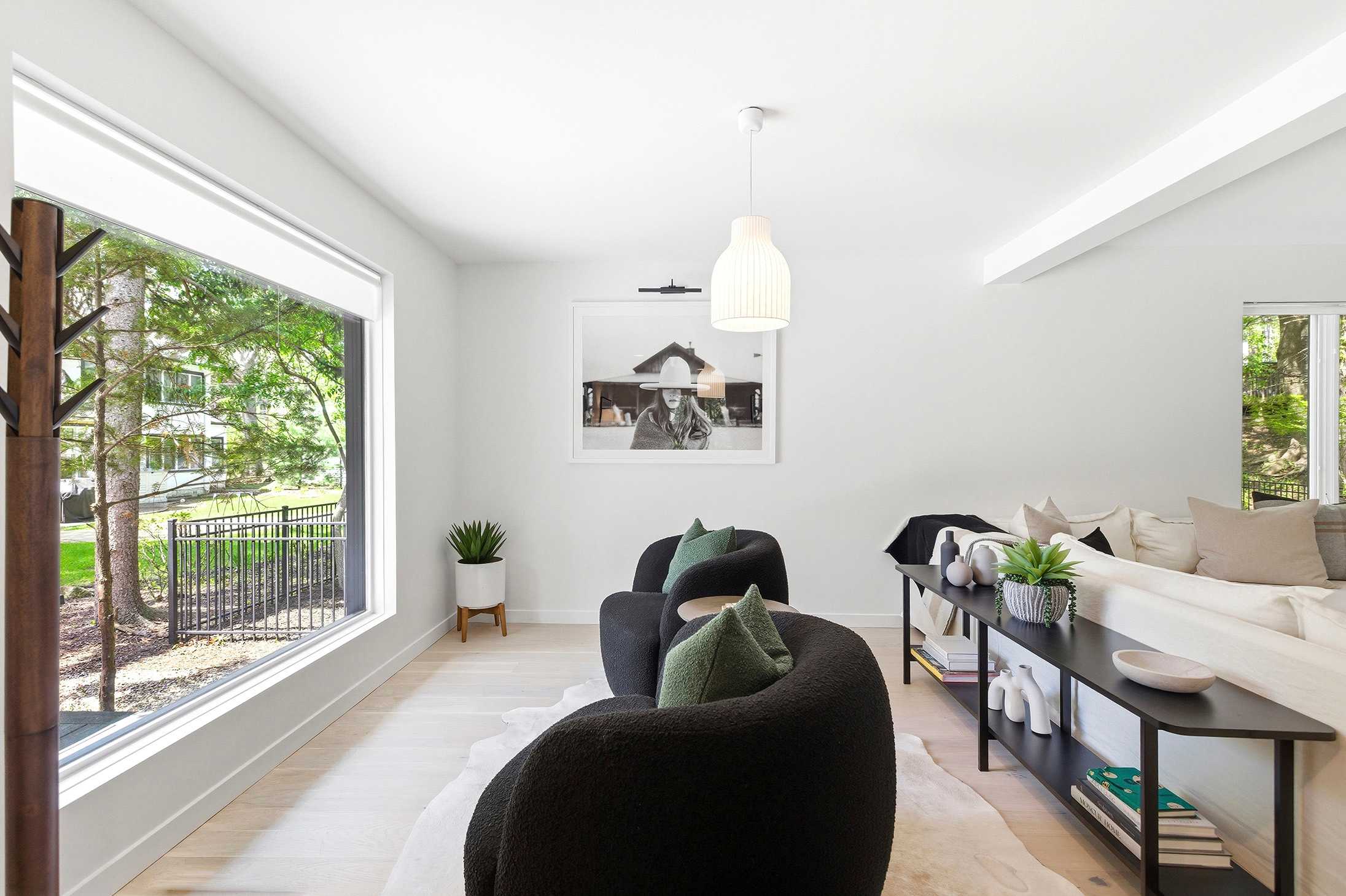 Chic seating, artsy vibes, and sunlight for days —the perfect nook for deep convos or deep scrolls.
