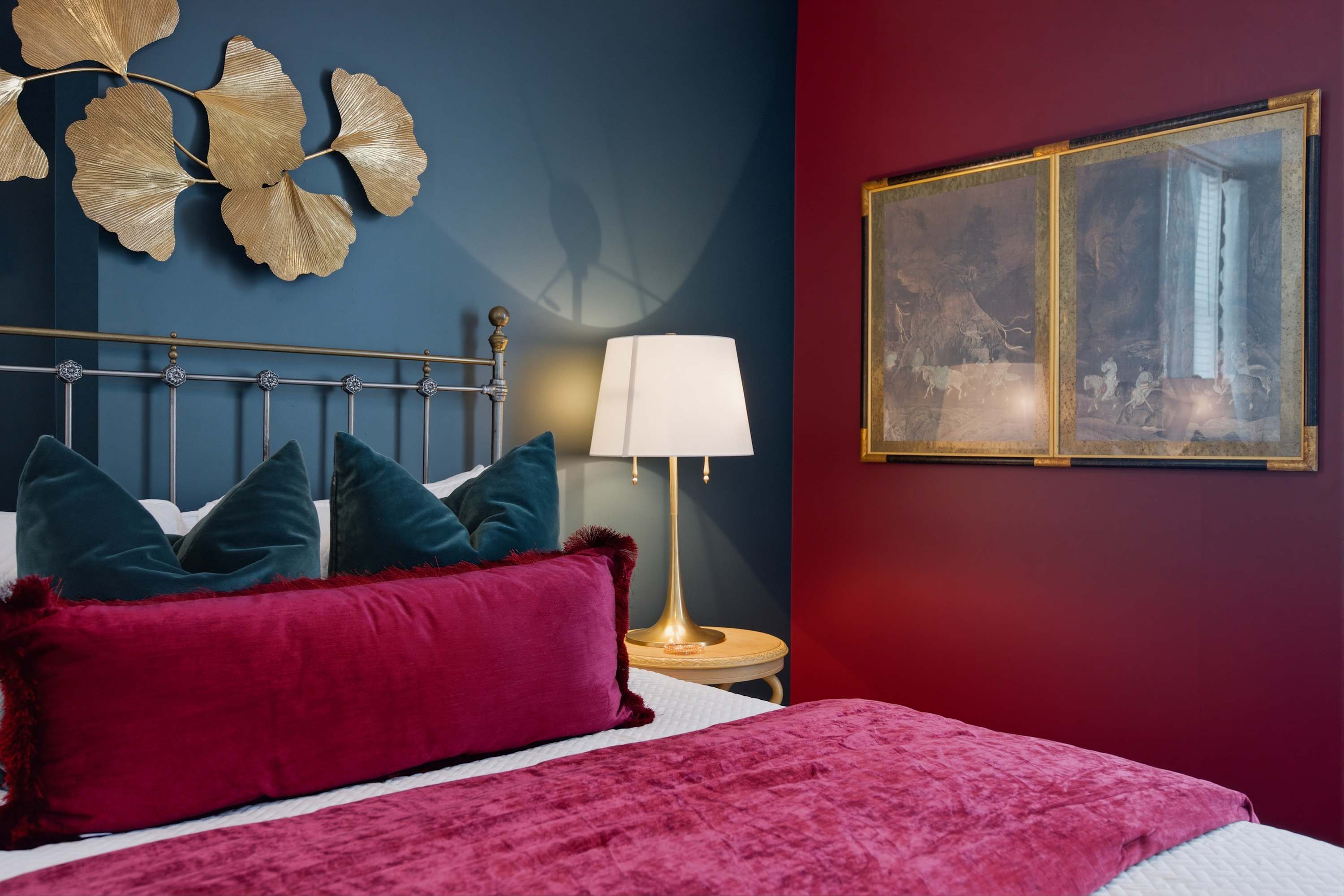 The bedroom retreat features a plush queen-sized bed​